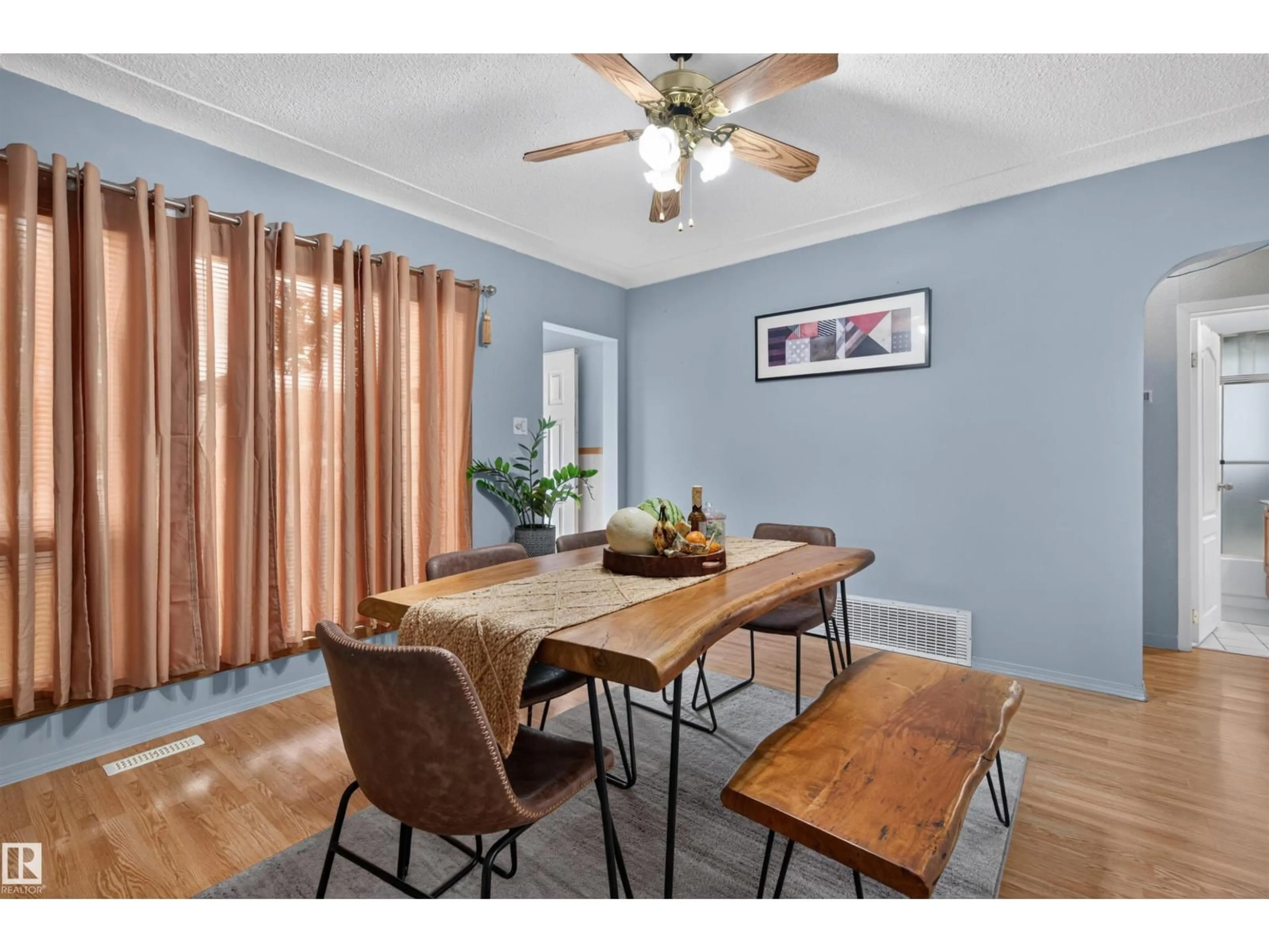 Dining room, wood/laminate floor for 11549 82 ST, Edmonton Alberta T5B2V7