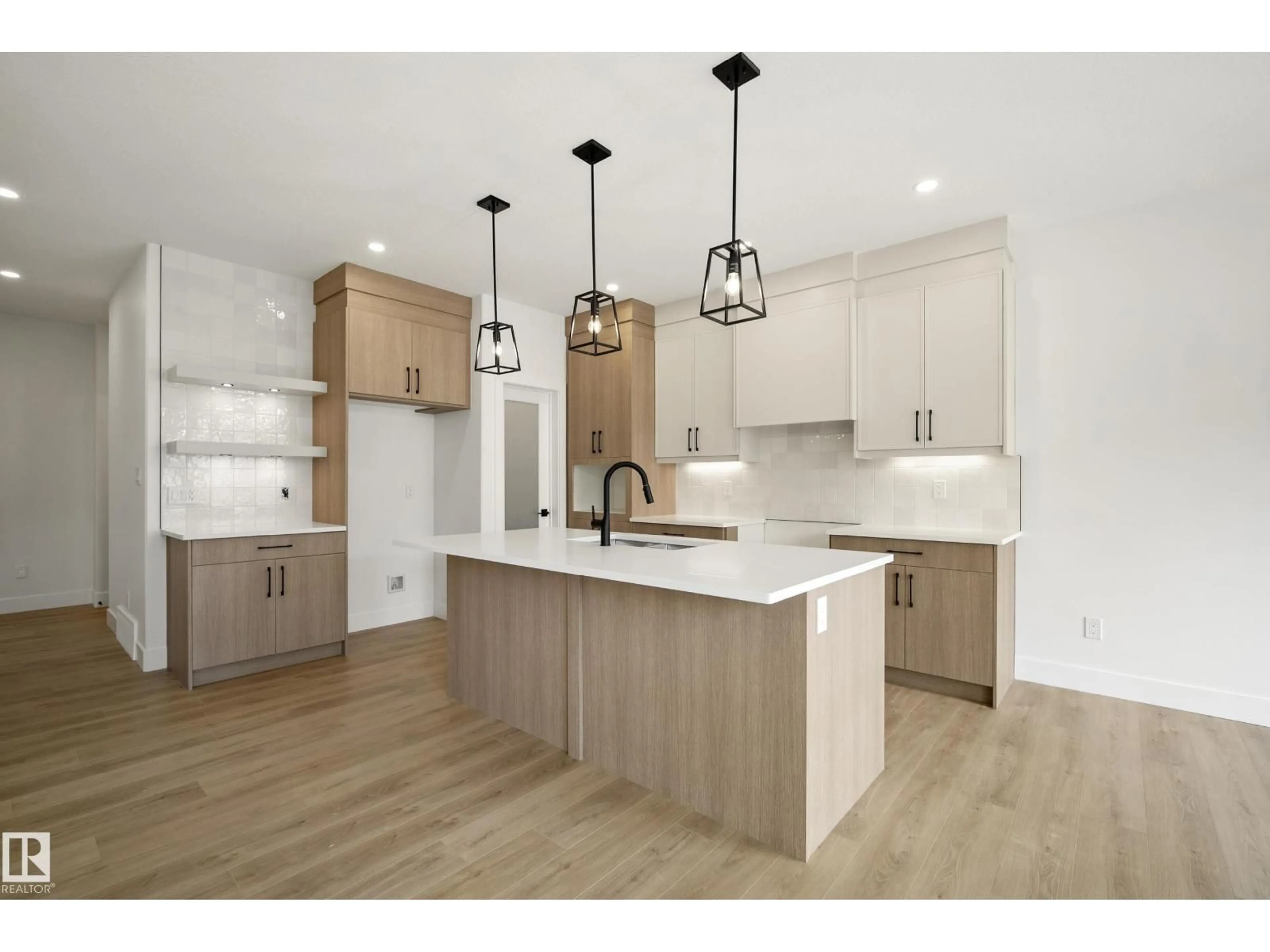Open concept kitchen, wood/laminate floor for NW - 8529 223A ST, Edmonton Alberta T5T8A2