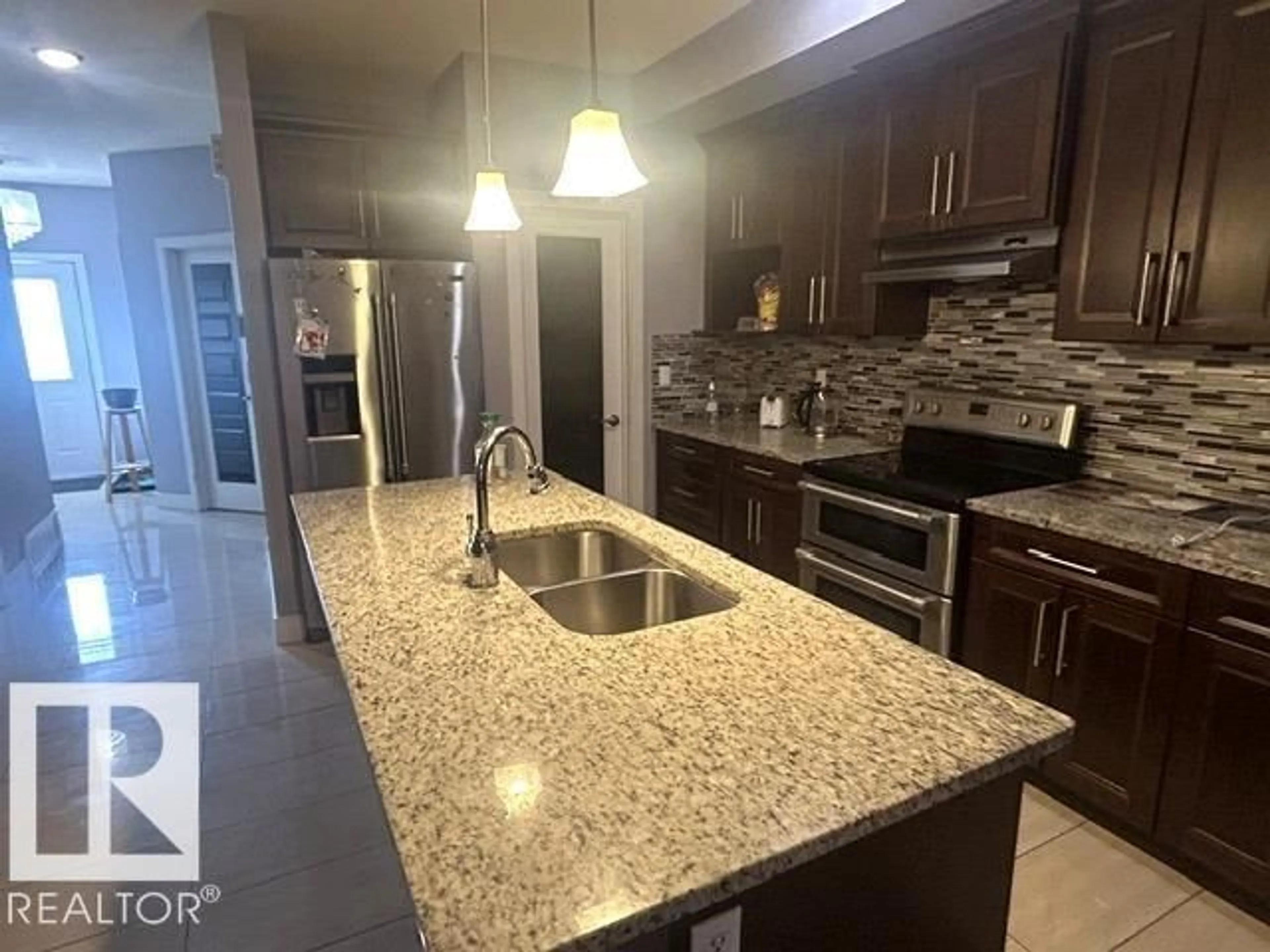 Open concept kitchen, ceramic/tile floor for 981 MCCONACHIE BV, Edmonton Alberta T5Y3N3