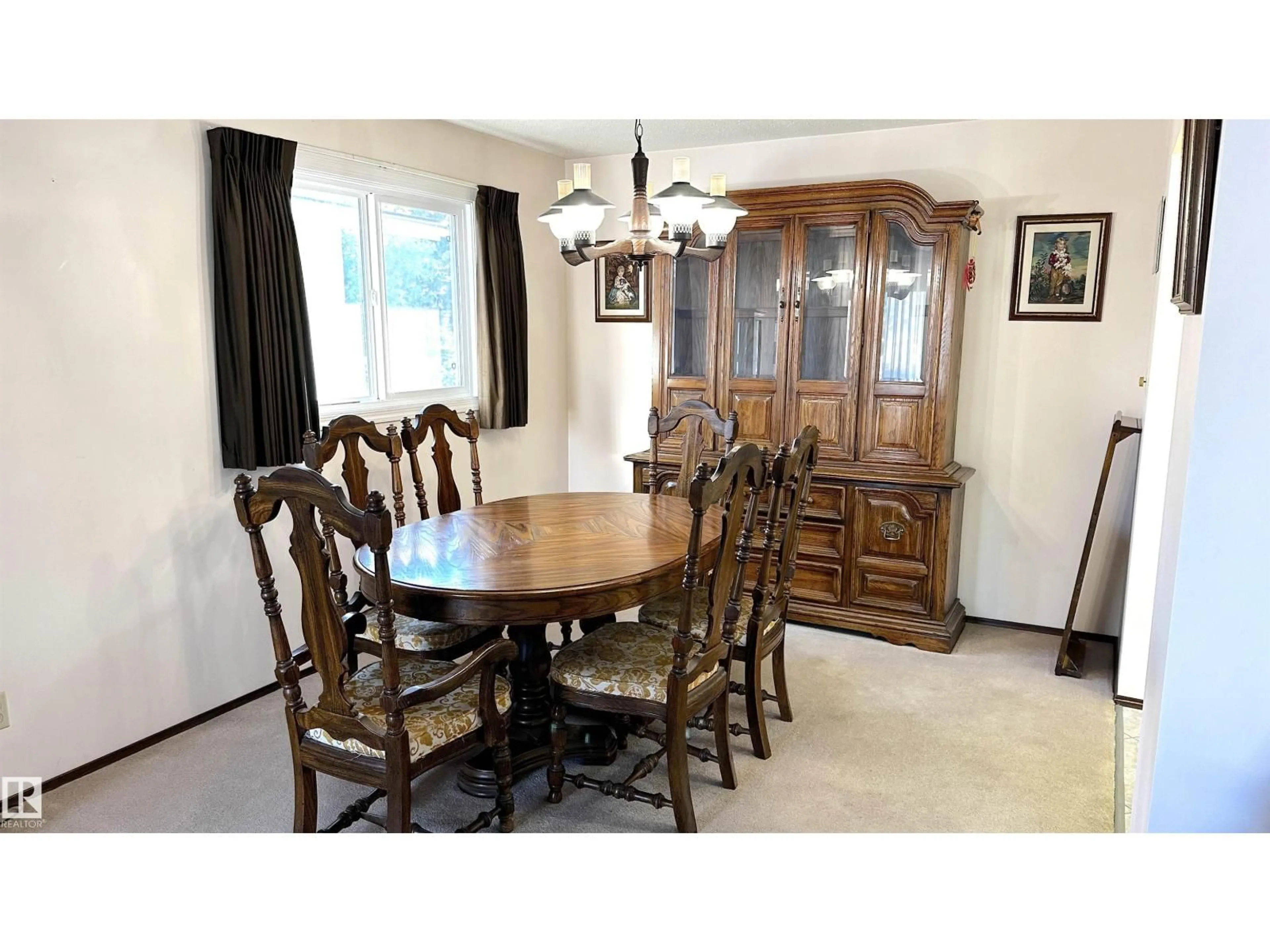 Dining room, wood/laminate floor for 4128 110 ST, Edmonton Alberta T6J2T5
