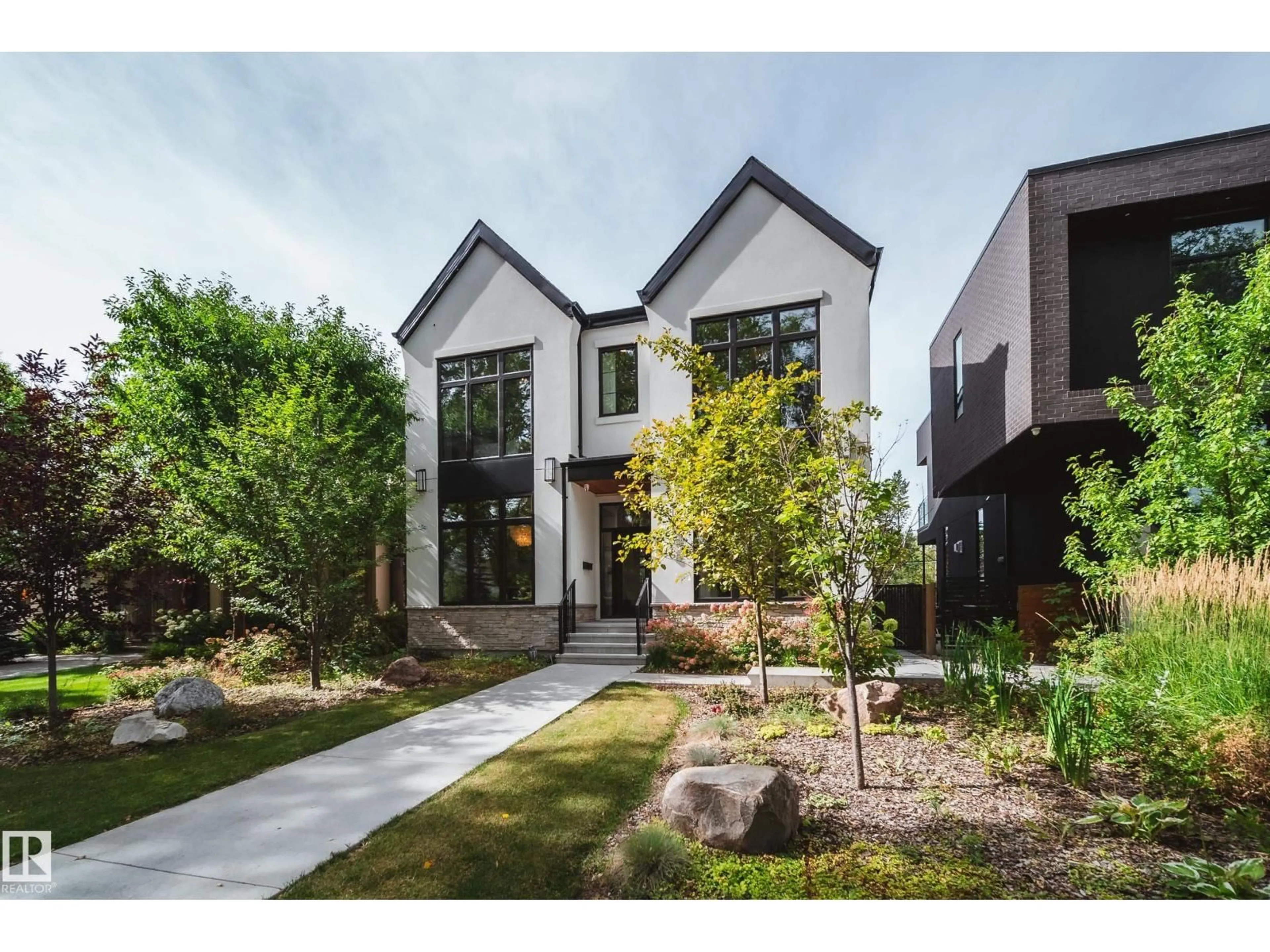 Home with brick exterior material, street for NW - 10228 130 ST, Edmonton Alberta T5N1X5