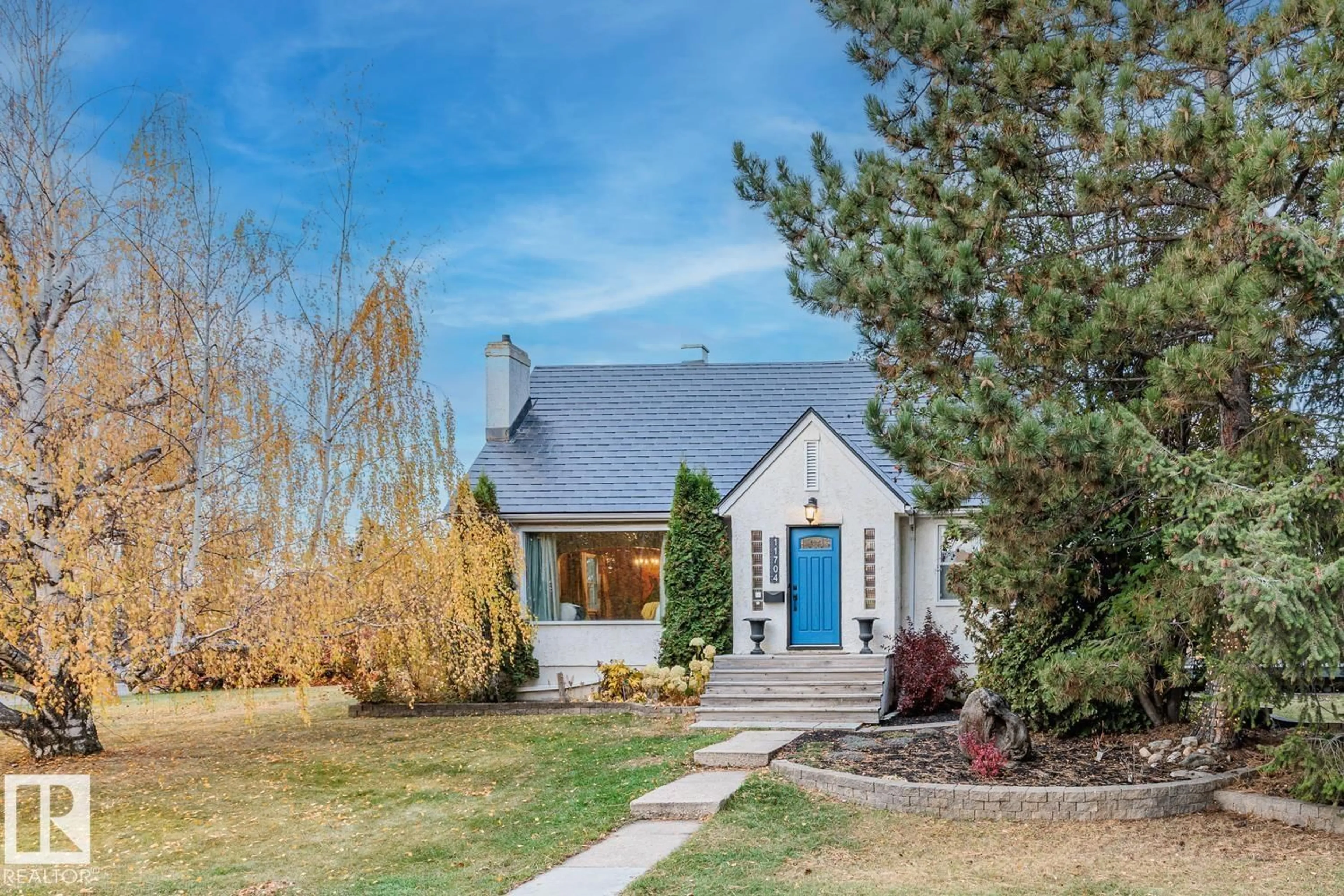 Home with vinyl exterior material, street for 11704 110A AV, Edmonton Alberta T5H1K8