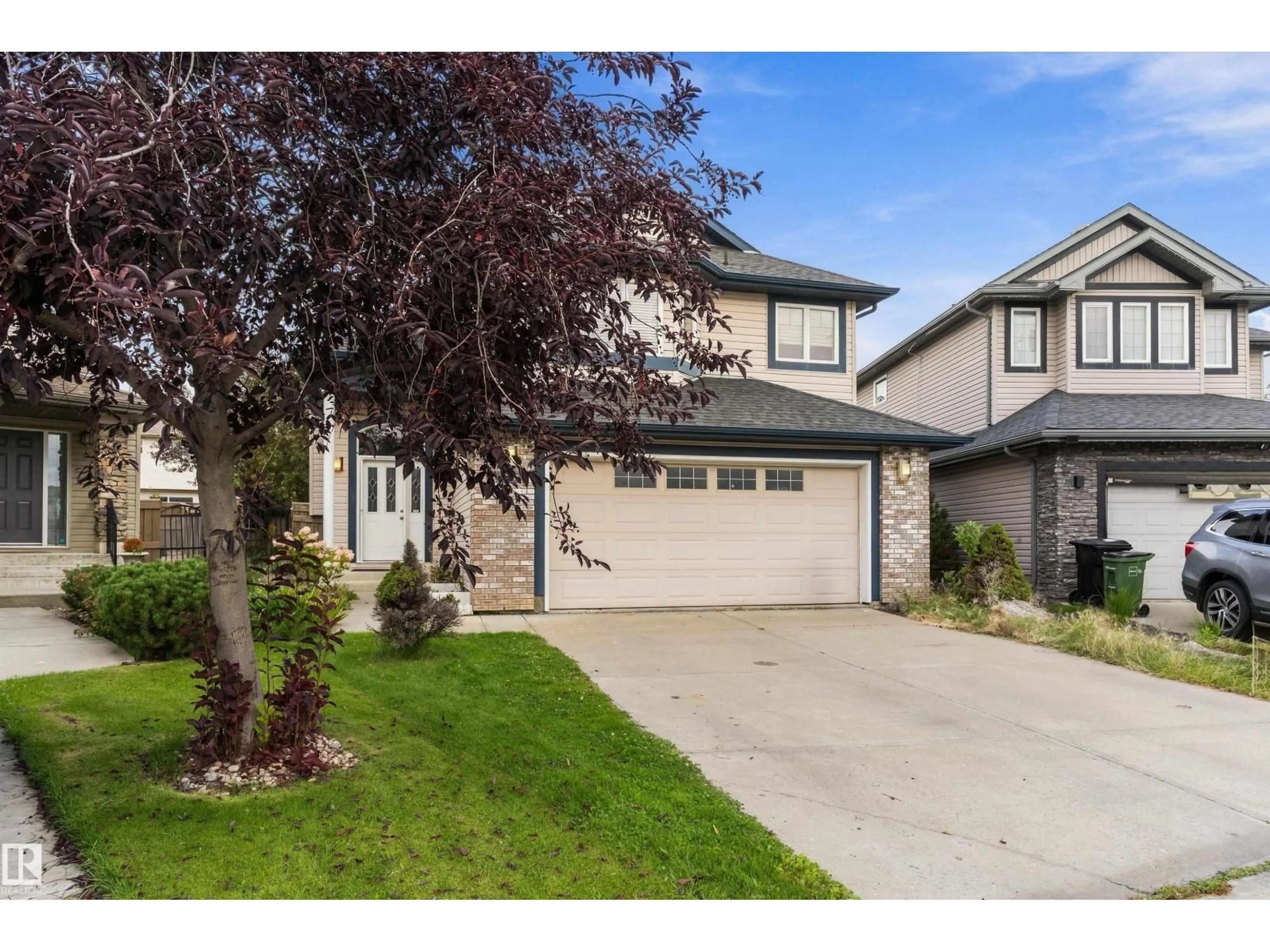 Home with vinyl exterior material, street for 8218 SHASKE PLACE, Edmonton Alberta T6R3V9