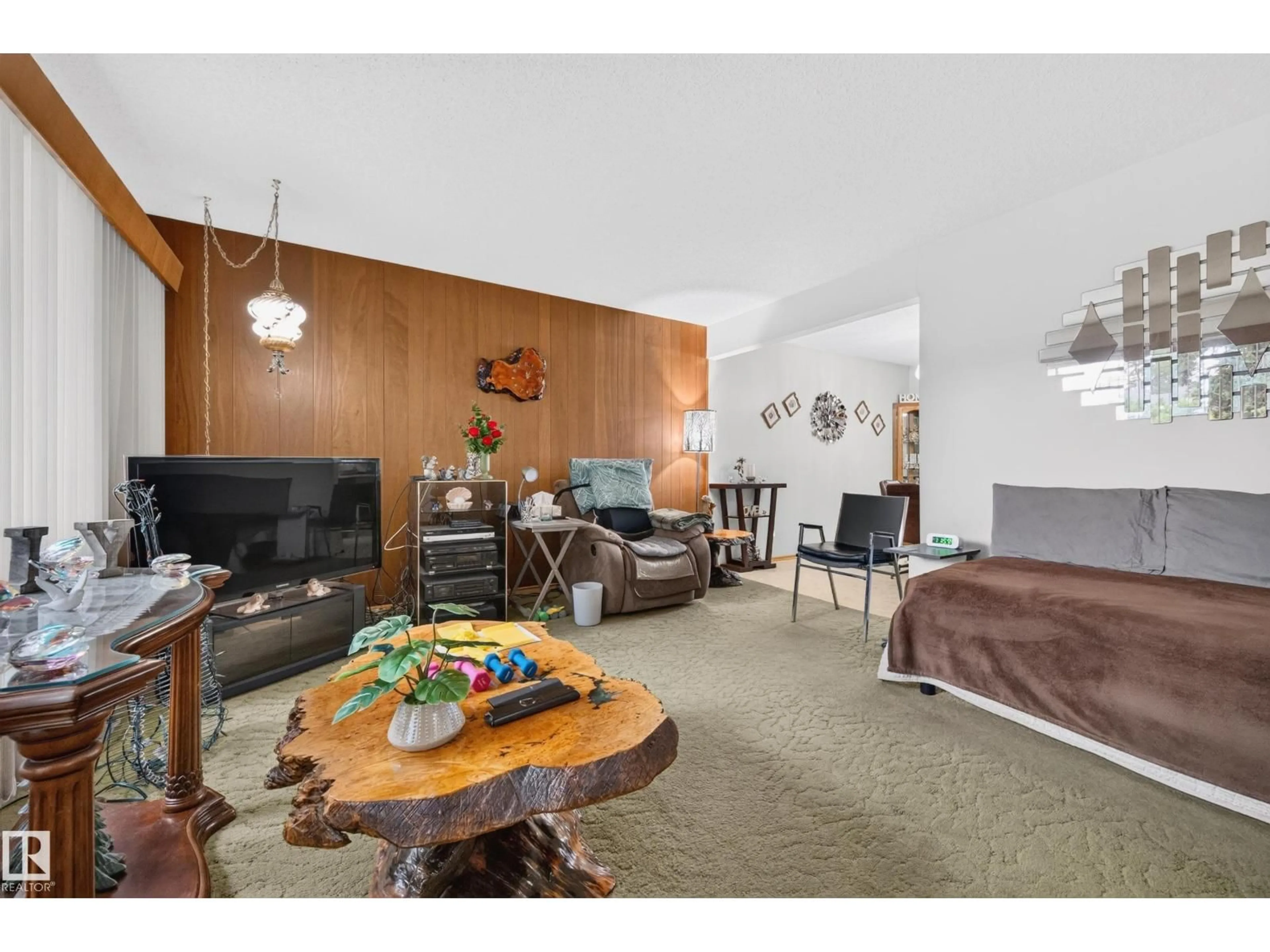 Living room with furniture, wood/laminate floor for 28 PEACOCK DR, Sherwood Park Alberta T8A0A9