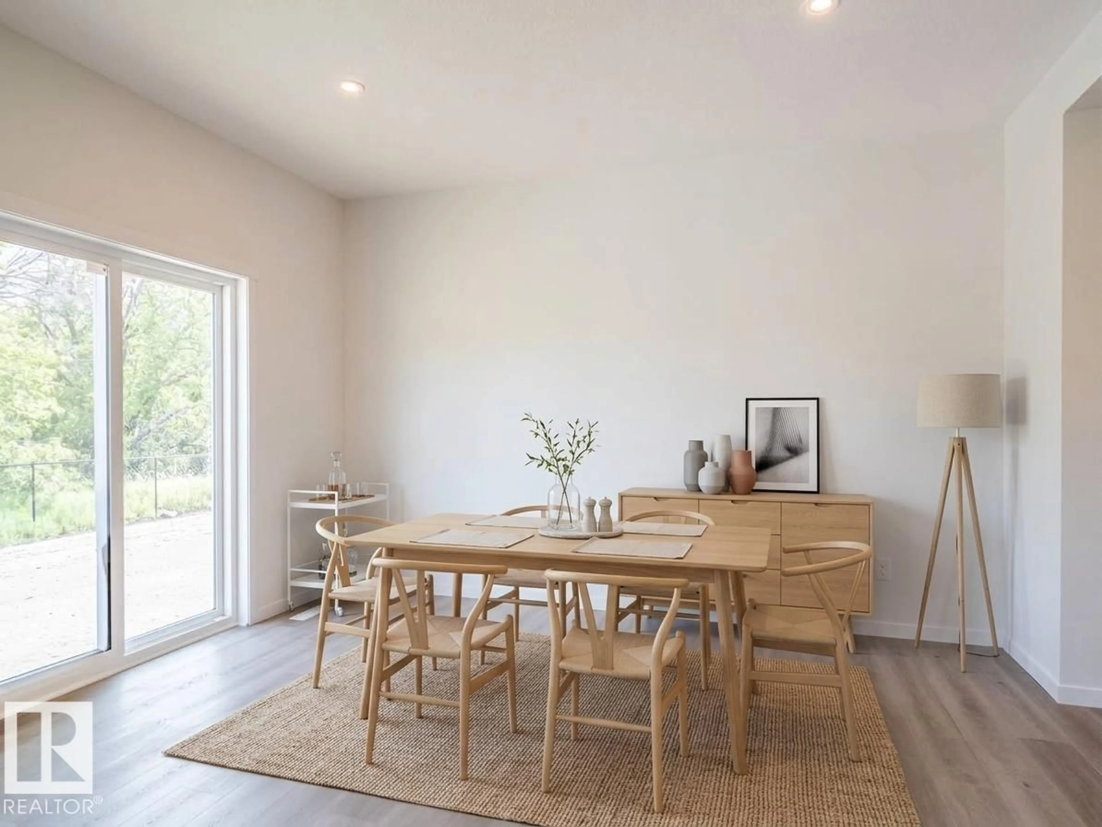 Dining room, wood/laminate floor for NE - 17735 7 ST, Edmonton Alberta T5Y4K3