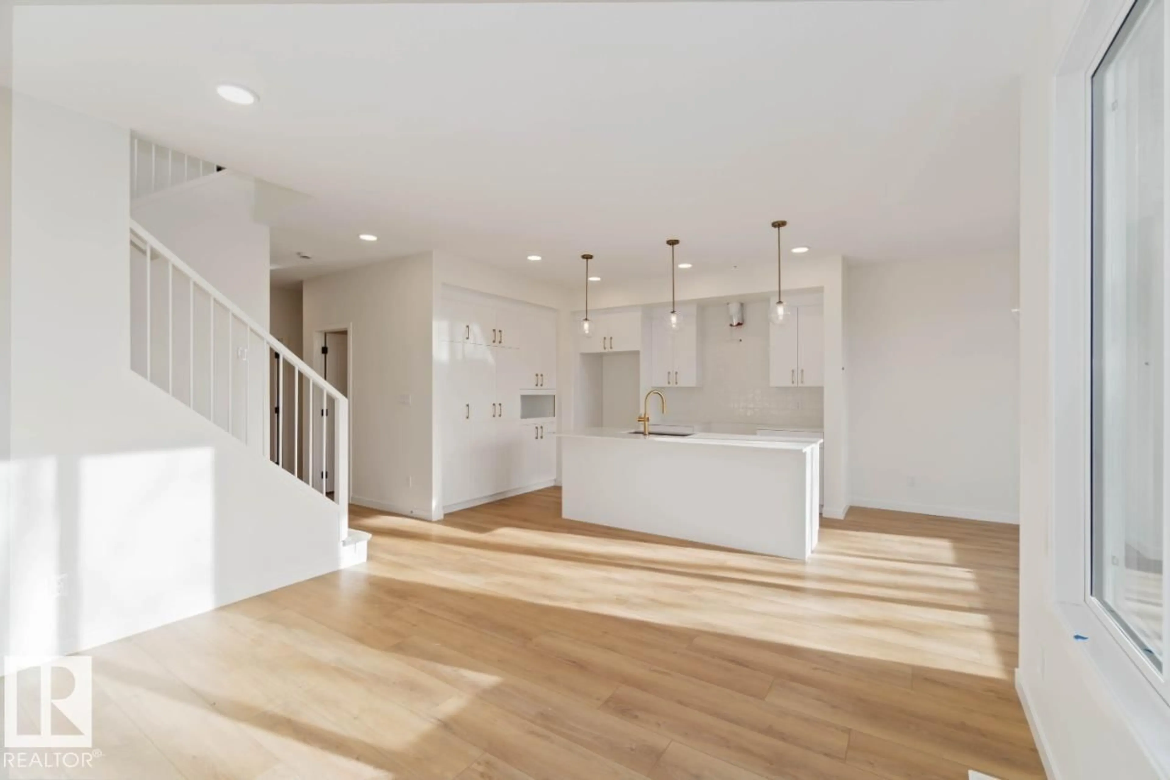 Open concept kitchen, wood/laminate floor for 80 ROSA CR, St. Albert Alberta T8N5T2