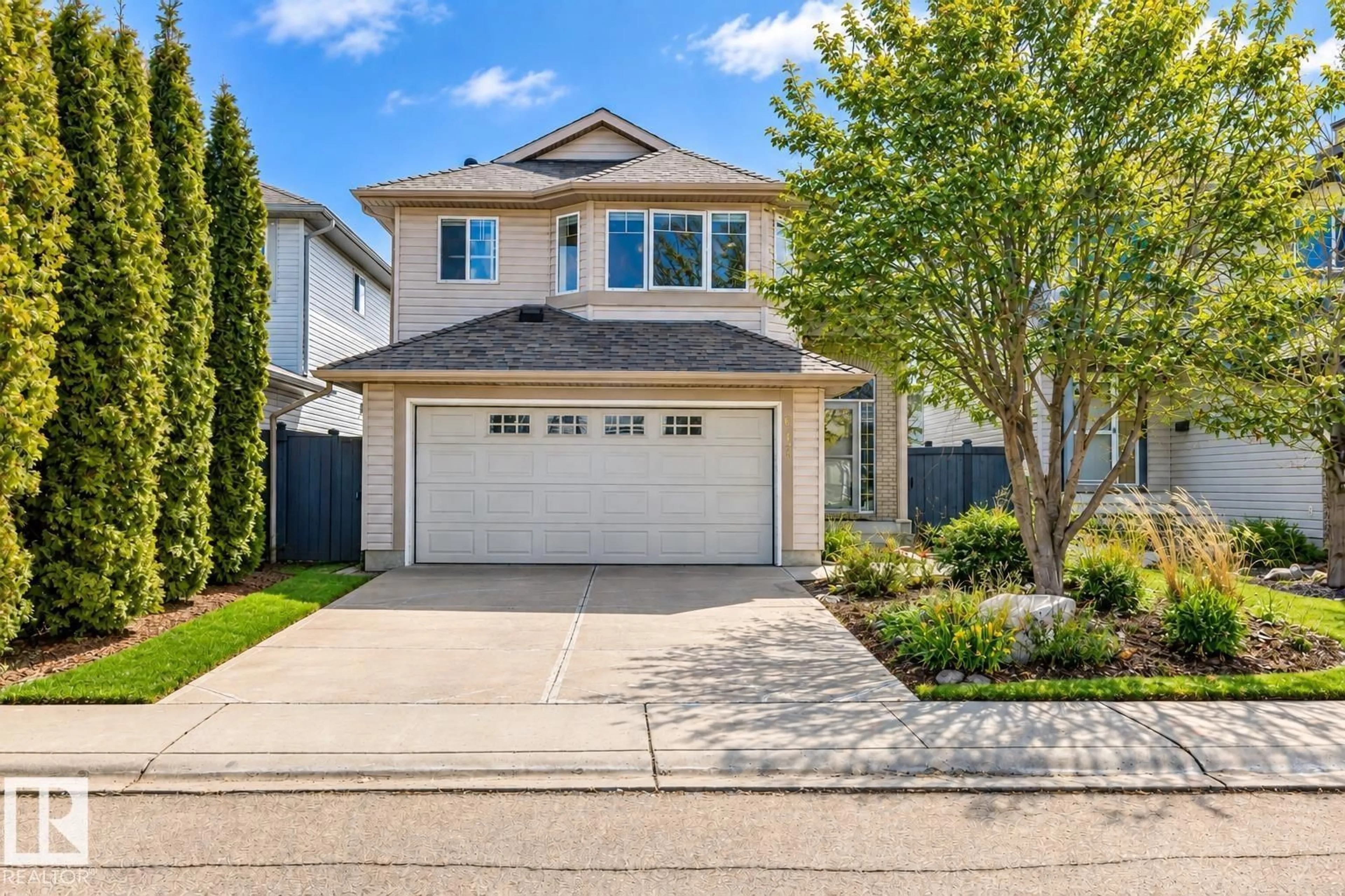 Home with vinyl exterior material, street for 617 BECK CL, Edmonton Alberta T6W1E6