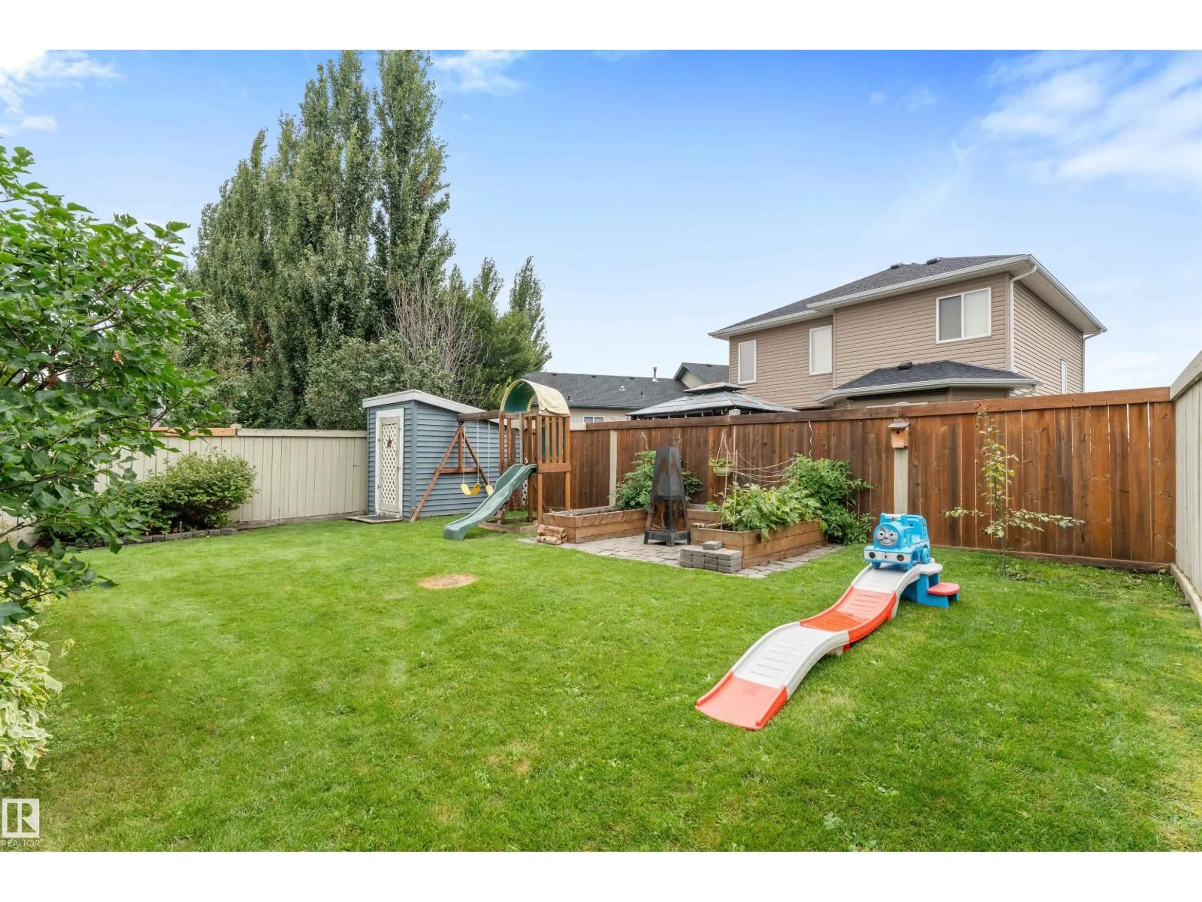 A pic from outside/outdoor area/front of a property/back of a property/a pic from drone, mountain view for 15 WILLOWBY CL, Stony Plain Alberta T7Z2W6