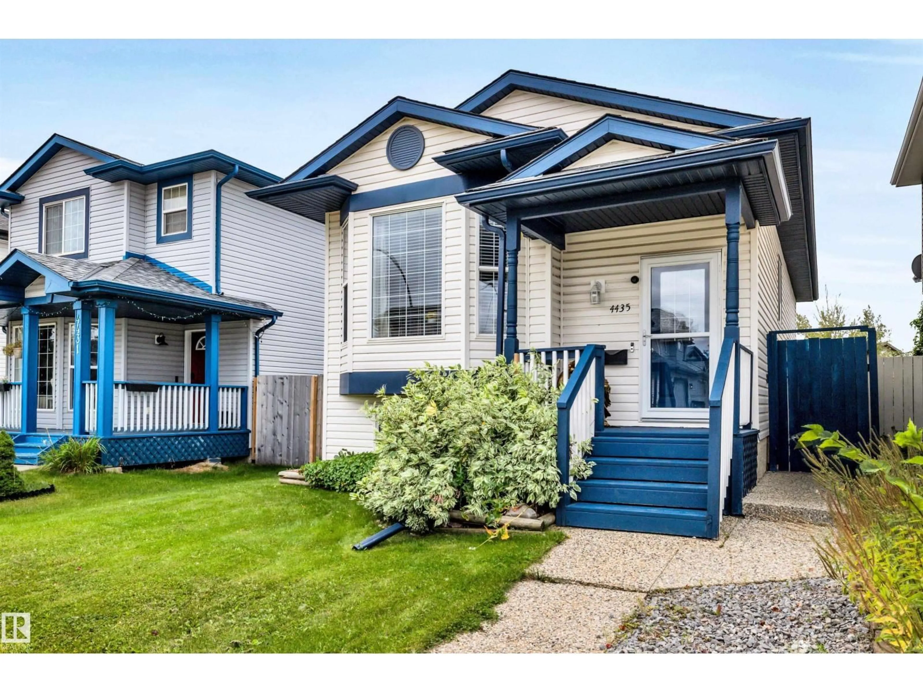 Home with vinyl exterior material, street for 4435 152 AV, Edmonton Alberta T5Y3C3
