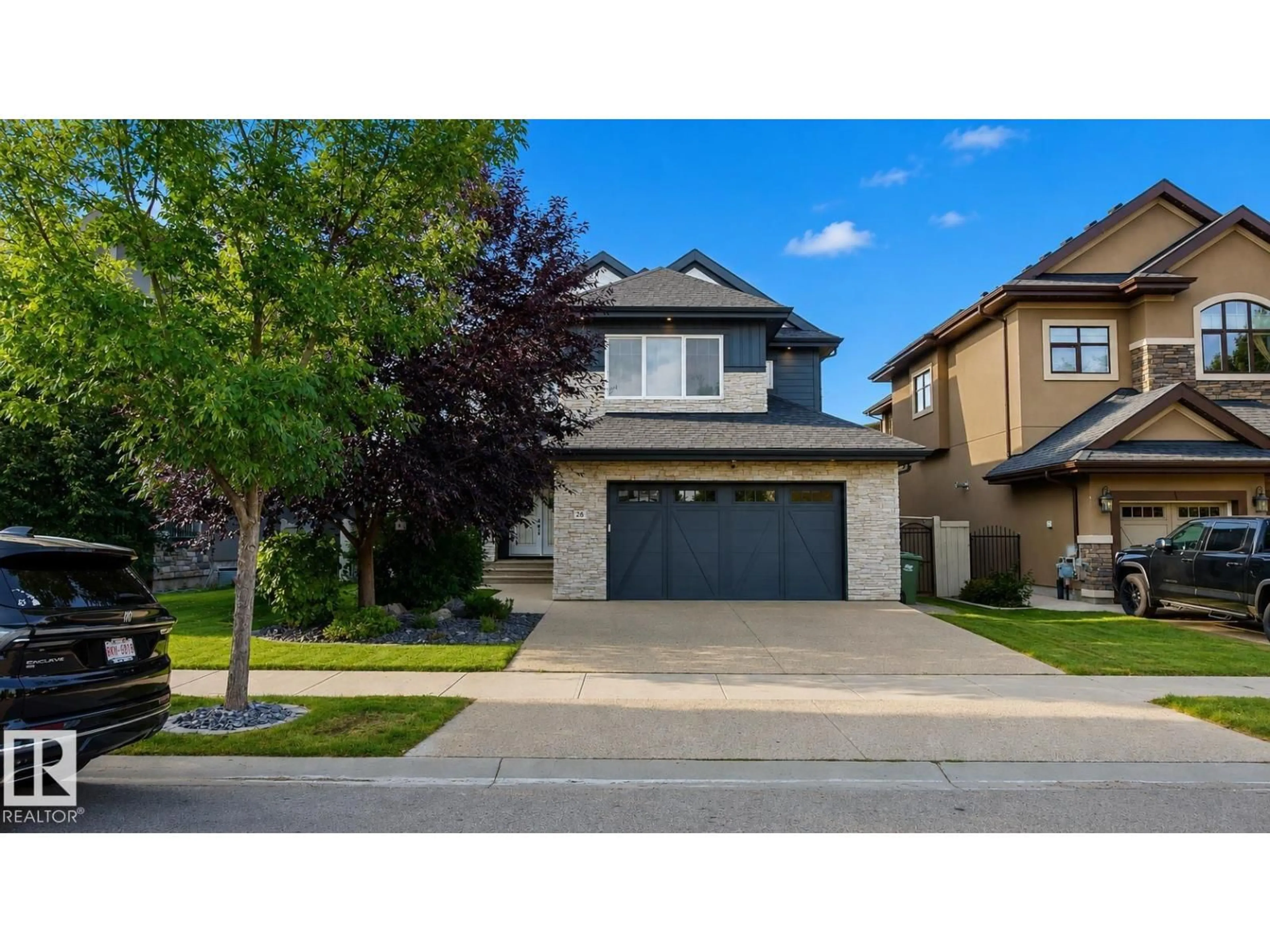 Home with vinyl exterior material, street for 26 EXECUTIVE WY, St. Albert Alberta T8N4G6