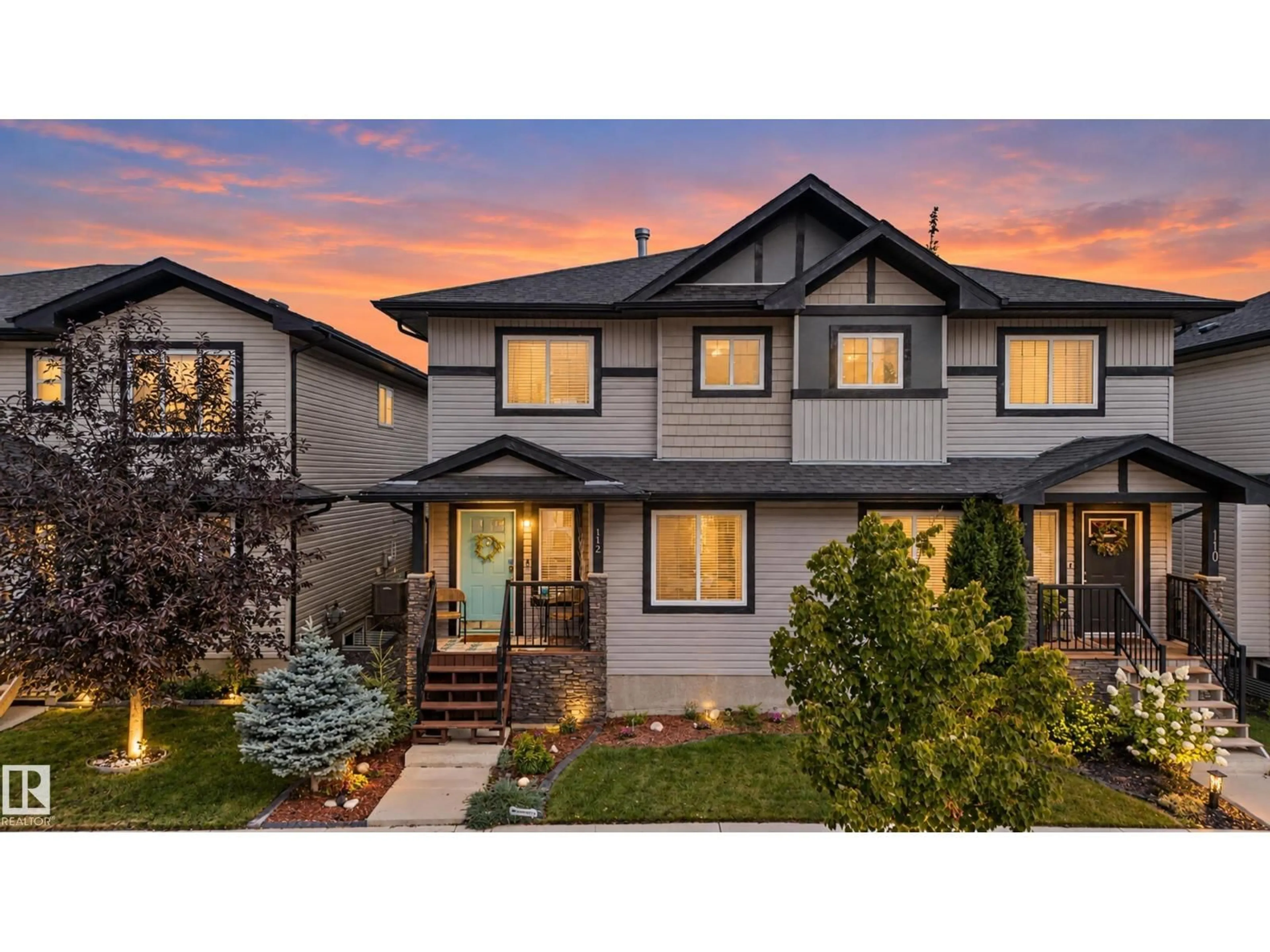 Home with vinyl exterior material, street for 112 RICHMOND LI, Fort Saskatchewan Alberta T8L0S6