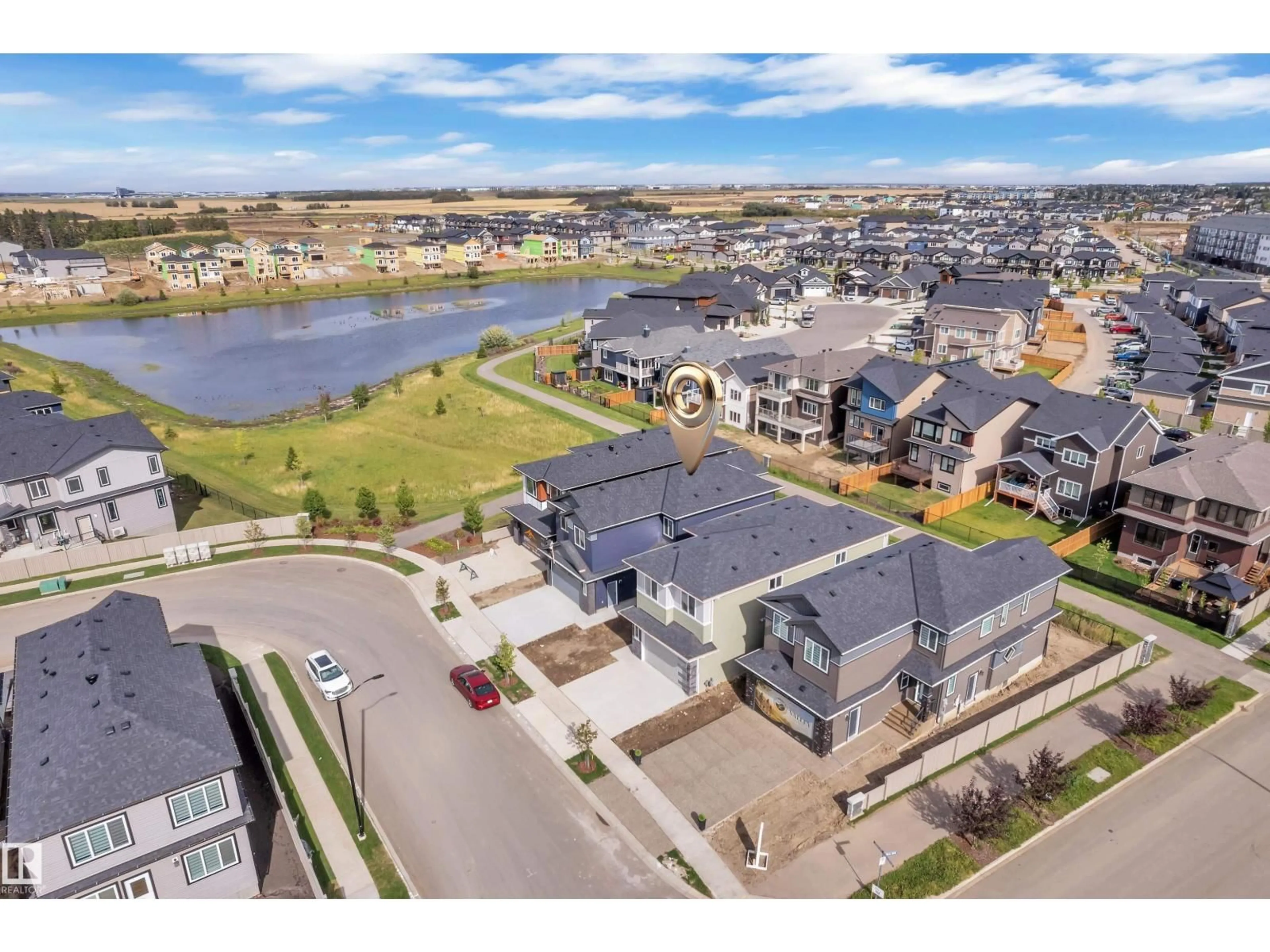 A pic from outside/outdoor area/front of a property/back of a property/a pic from drone, water/lake/river/ocean view for 204 LINDEN LO, Leduc Alberta T9E1T2