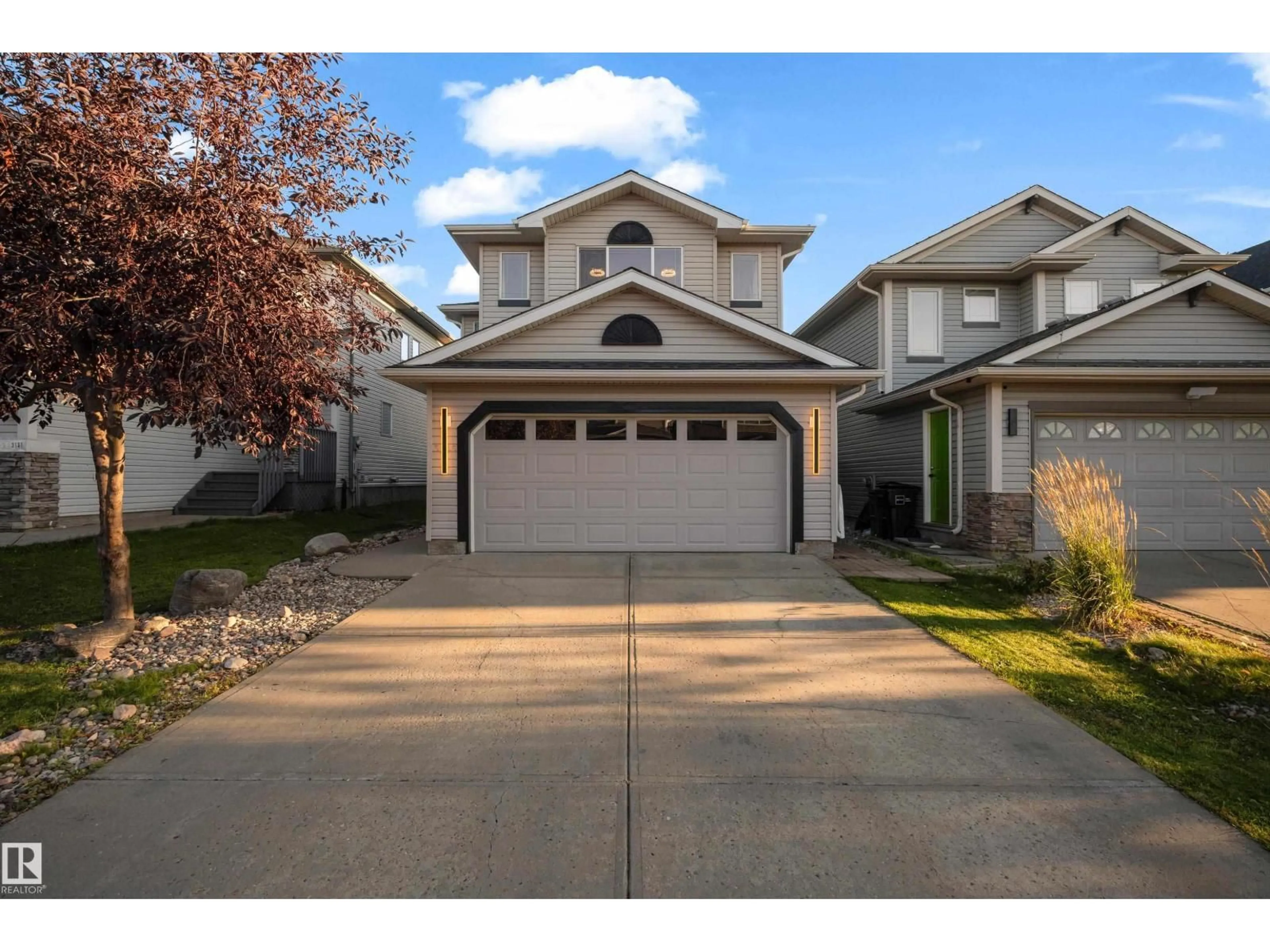 Home with vinyl exterior material, street for 3135 24 AV, Edmonton Alberta T6T0C9