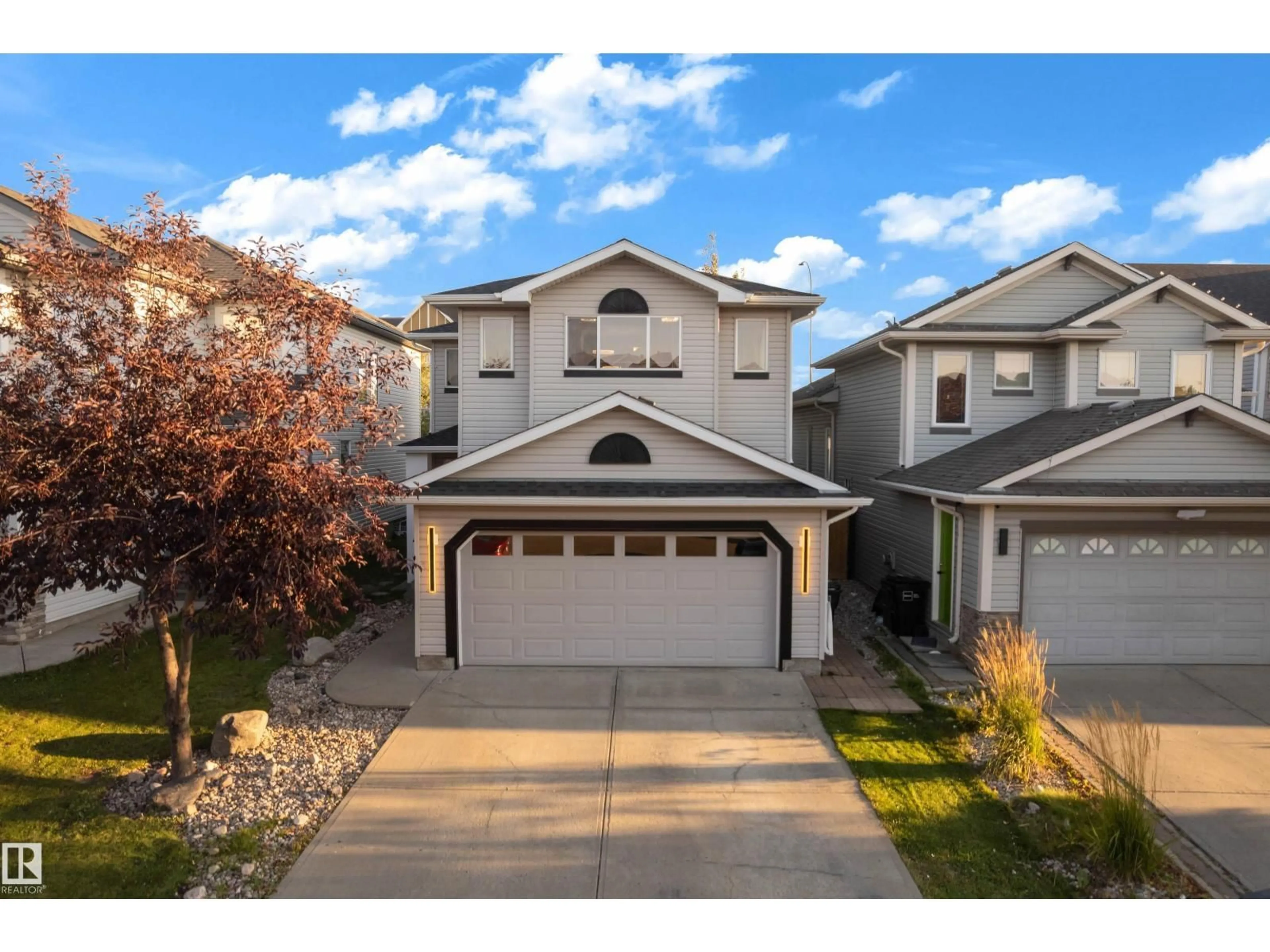 Home with vinyl exterior material, street for 3135 24 AV, Edmonton Alberta T6T0C9
