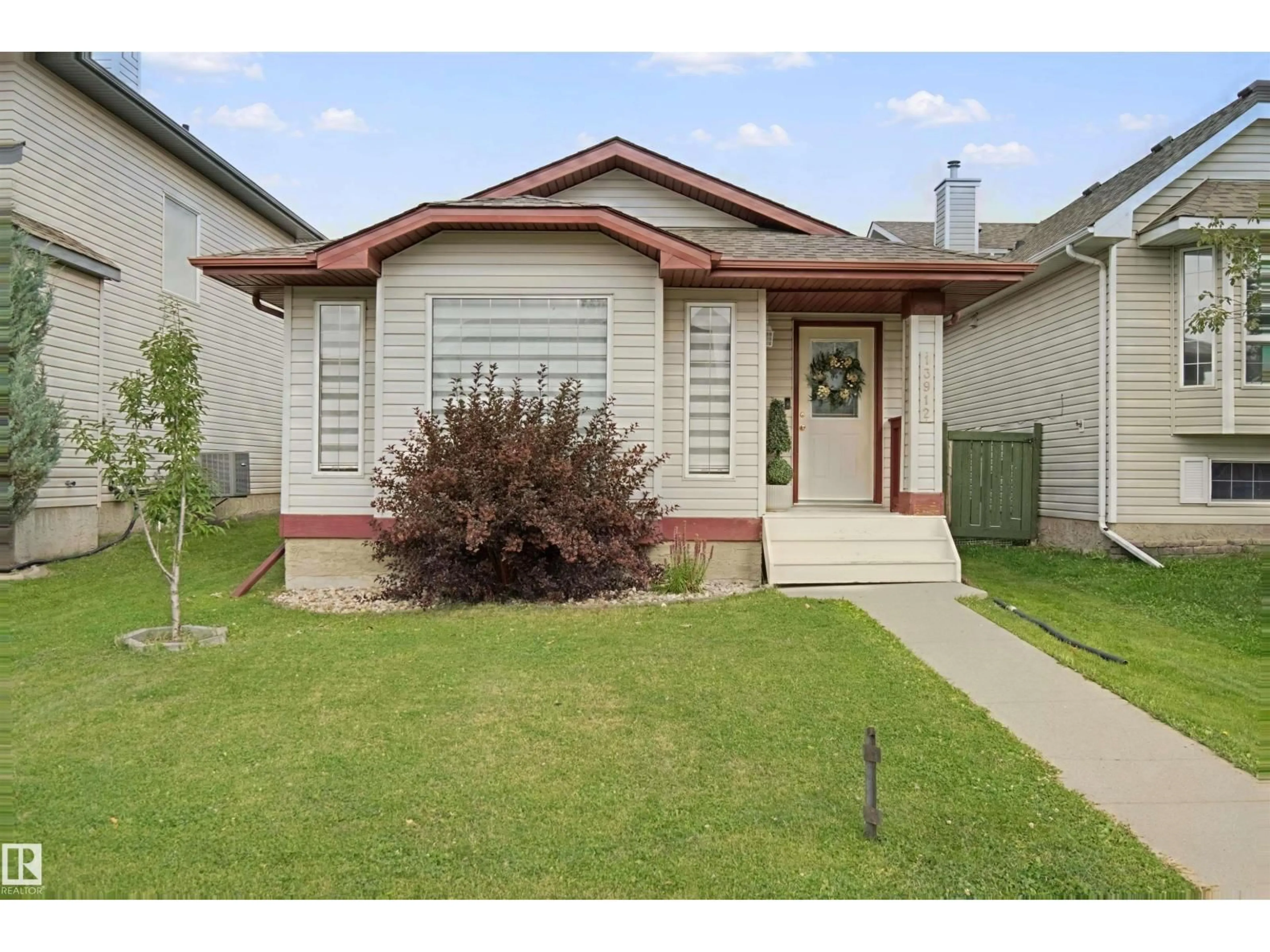 Home with vinyl exterior material, street for 13912 156 AV, Edmonton Alberta T6V1T3