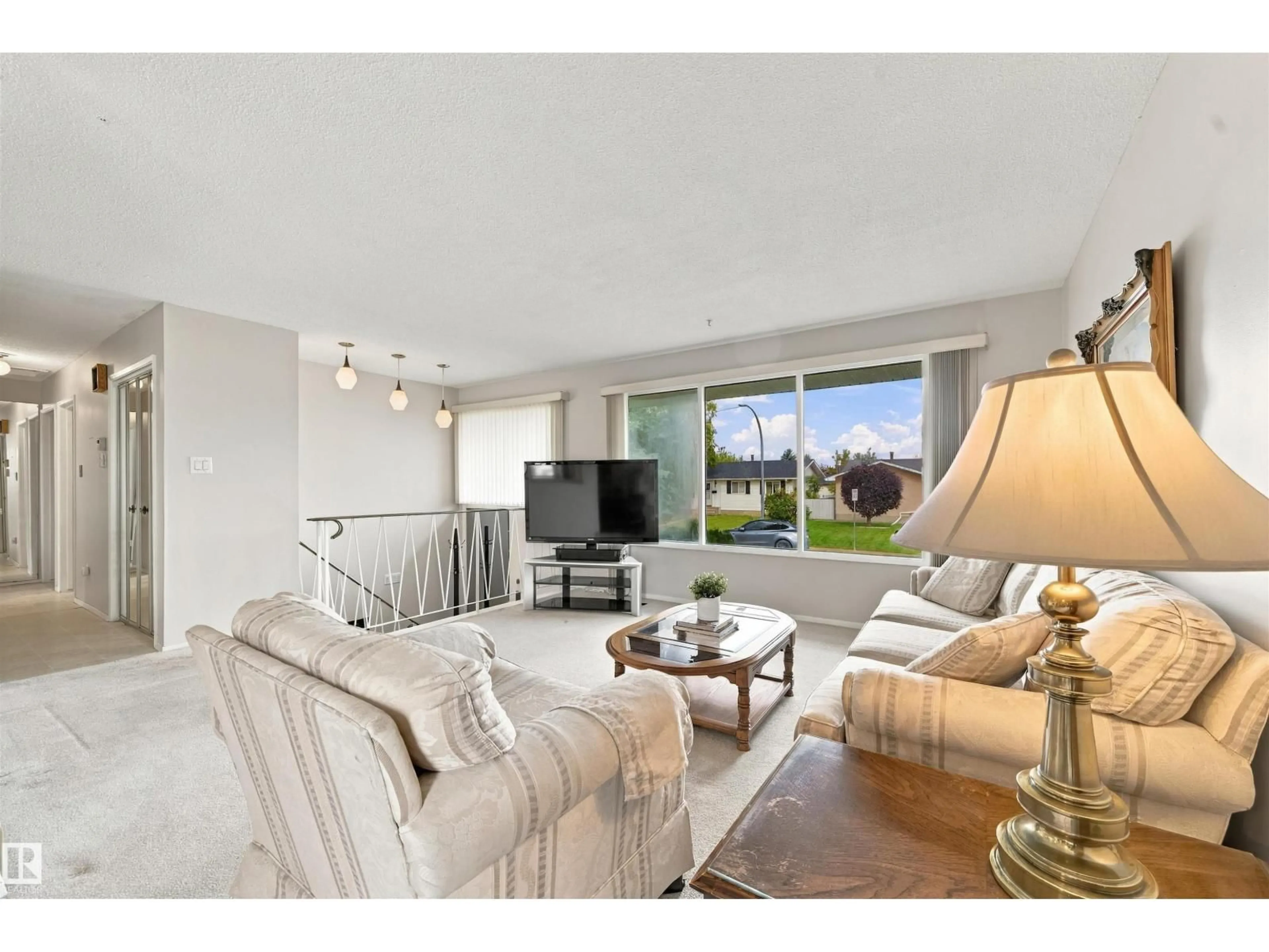 Living room with furniture, unknown for 7911 152A AV, Edmonton Alberta T5C3A1