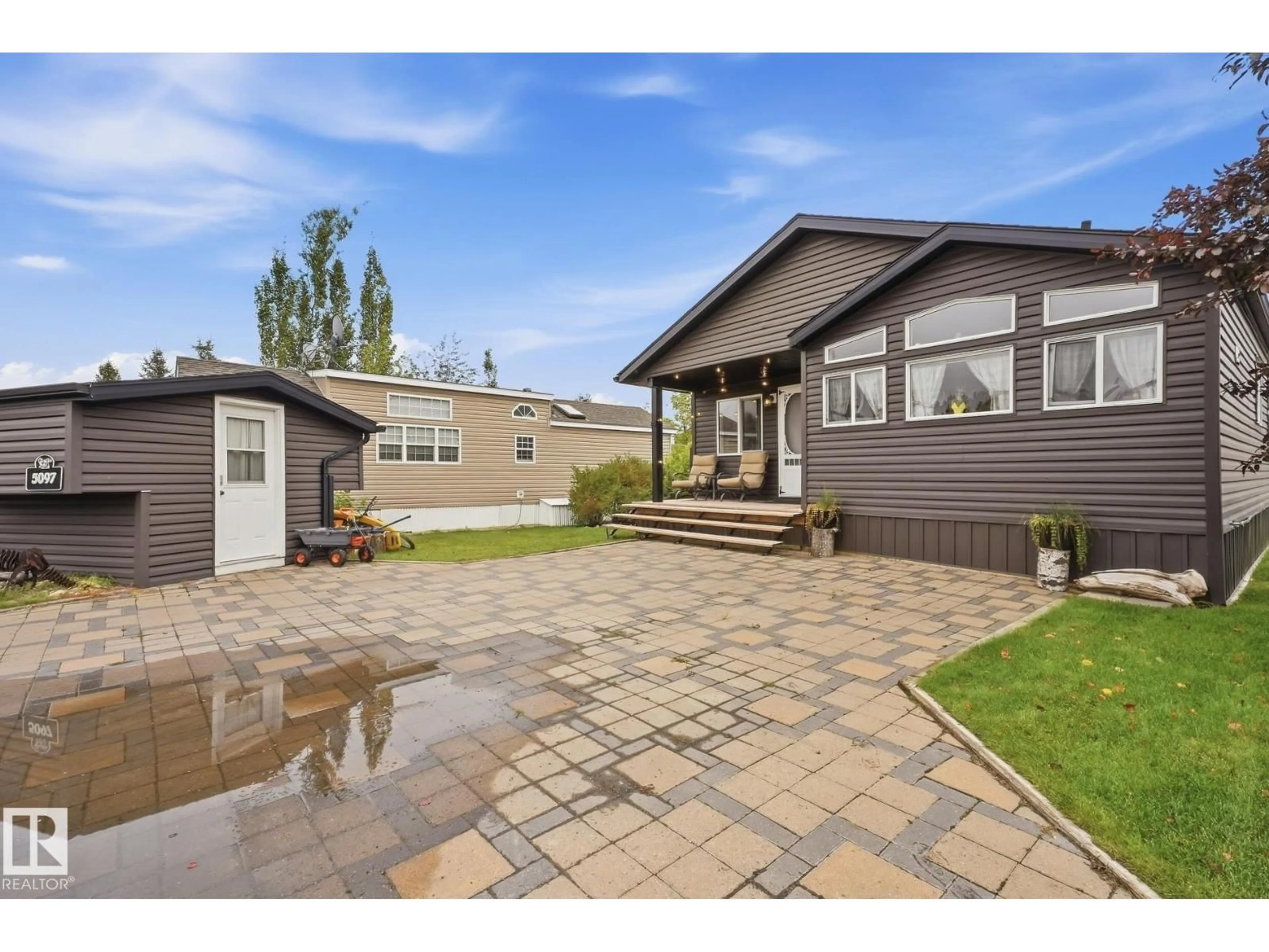 Home with vinyl exterior material, street for 35468 - 5097 RANGE ROAD 30, Rural Red Deer County Alberta T4G0M3