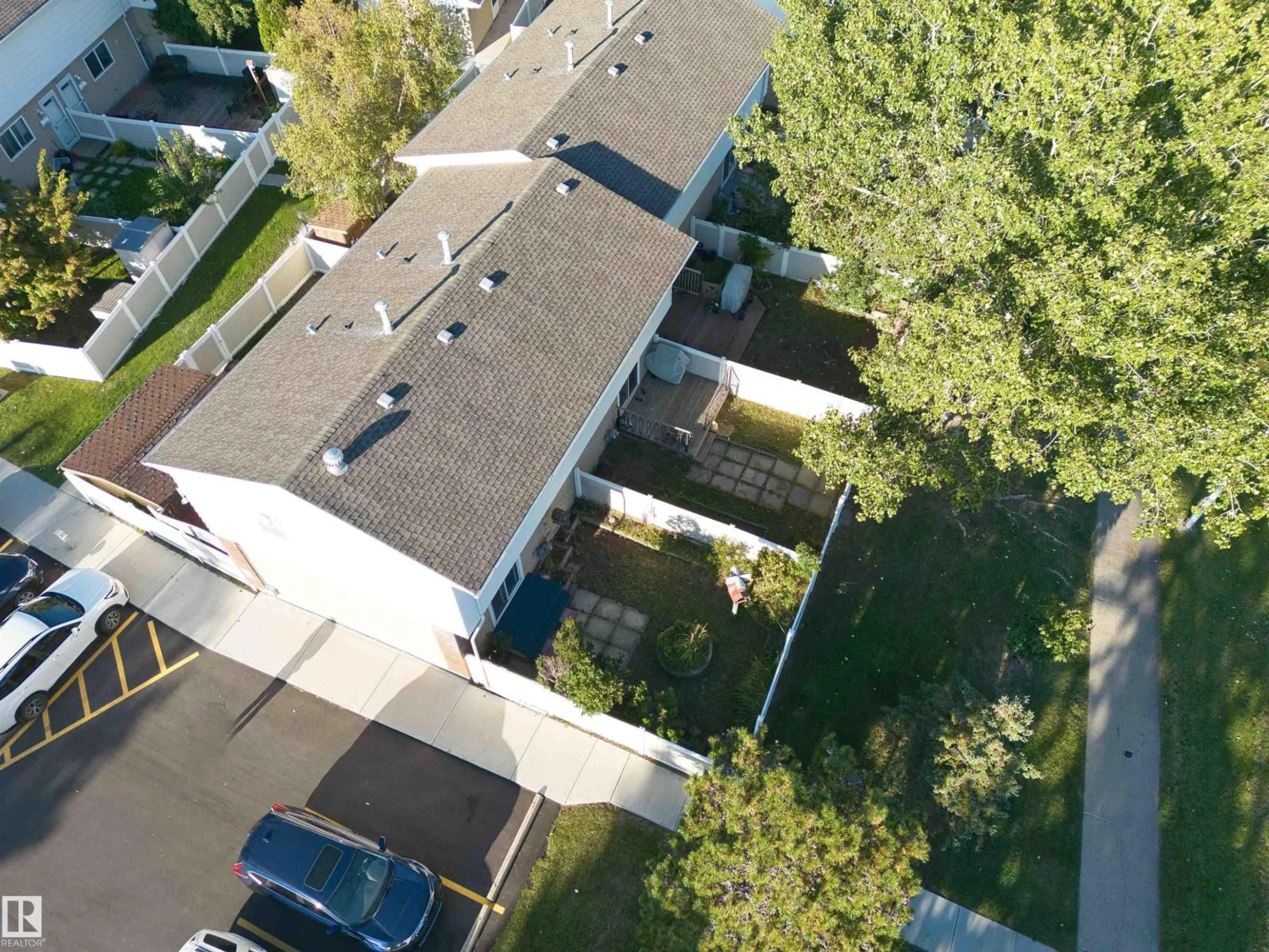 A pic from outside/outdoor area/front of a property/back of a property/a pic from drone, street for 7743 37 AV, Edmonton Alberta T6K1T9