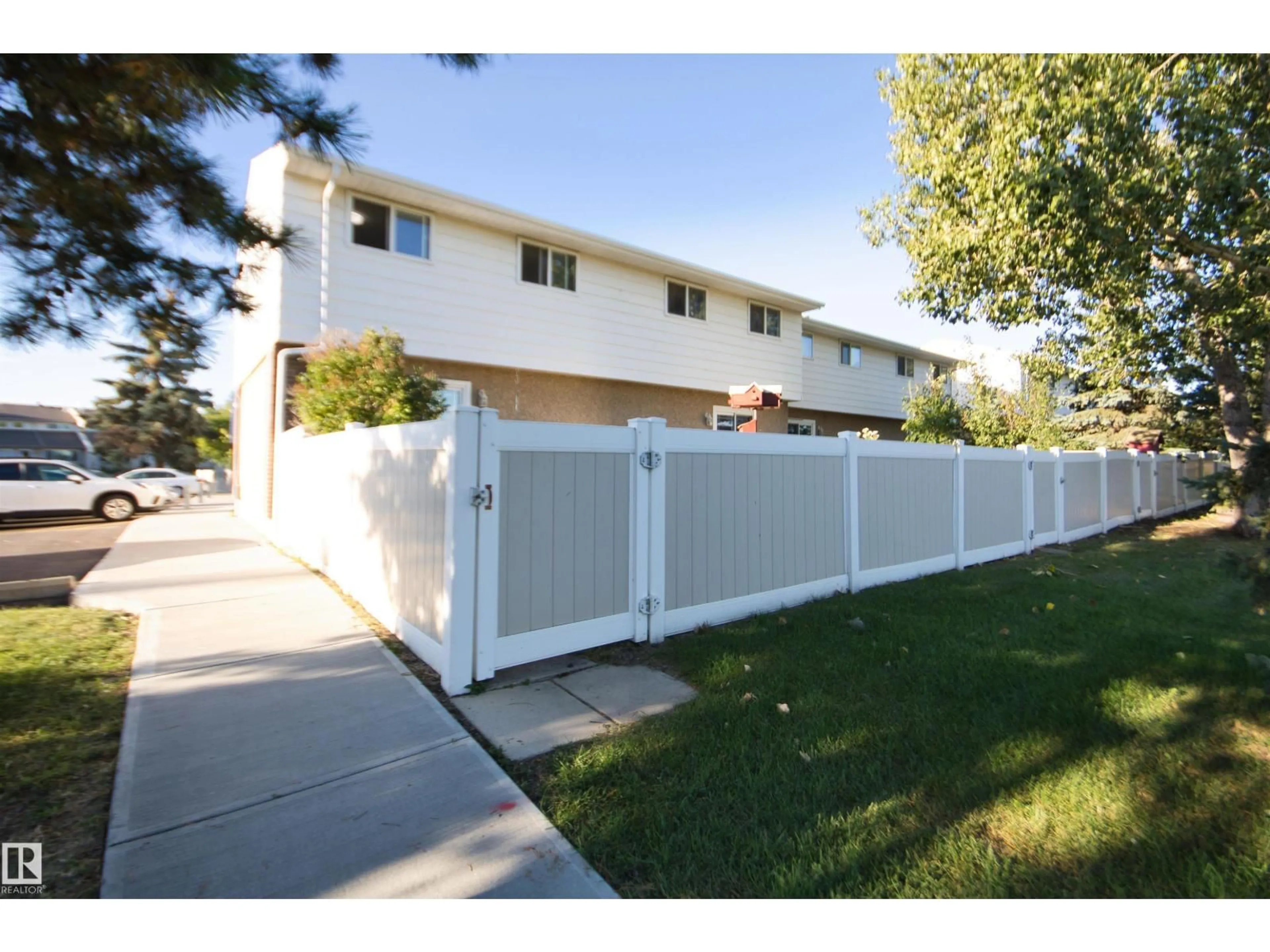 Home with vinyl exterior material, street for 7743 37 AV, Edmonton Alberta T6K1T9