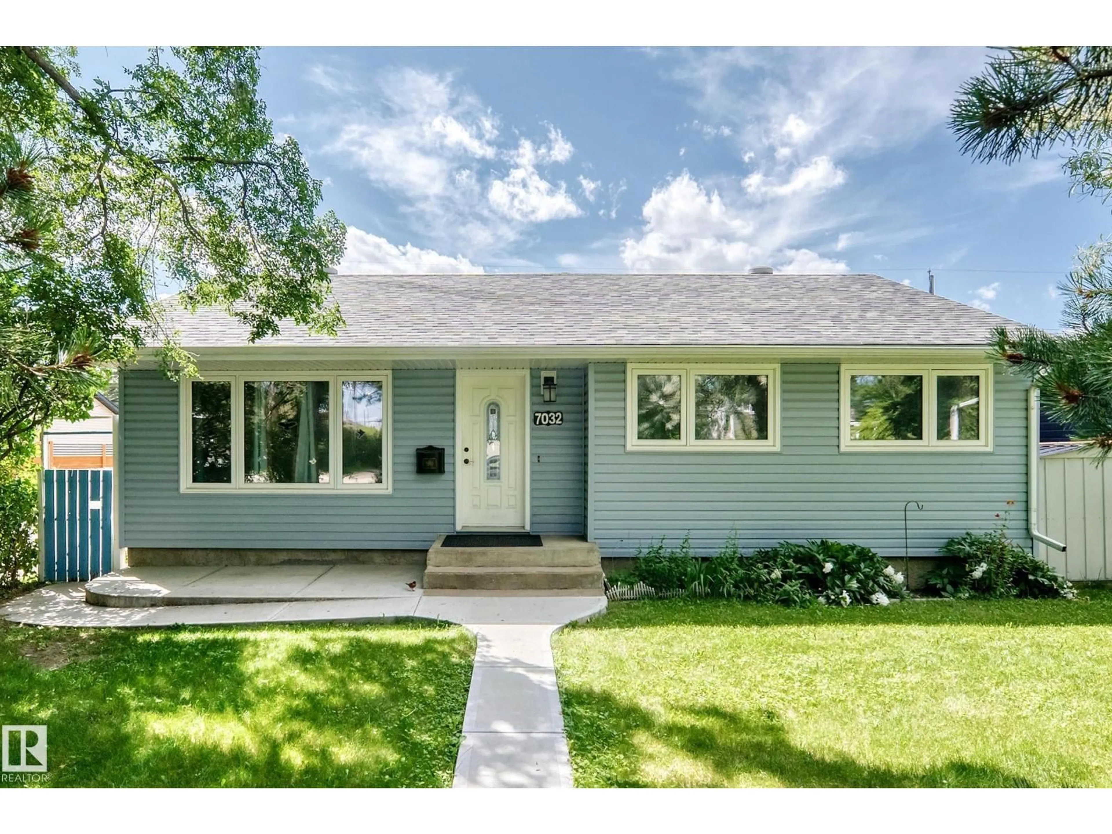 Home with vinyl exterior material, street for 7032 81 ST, Edmonton Alberta T6C2T4