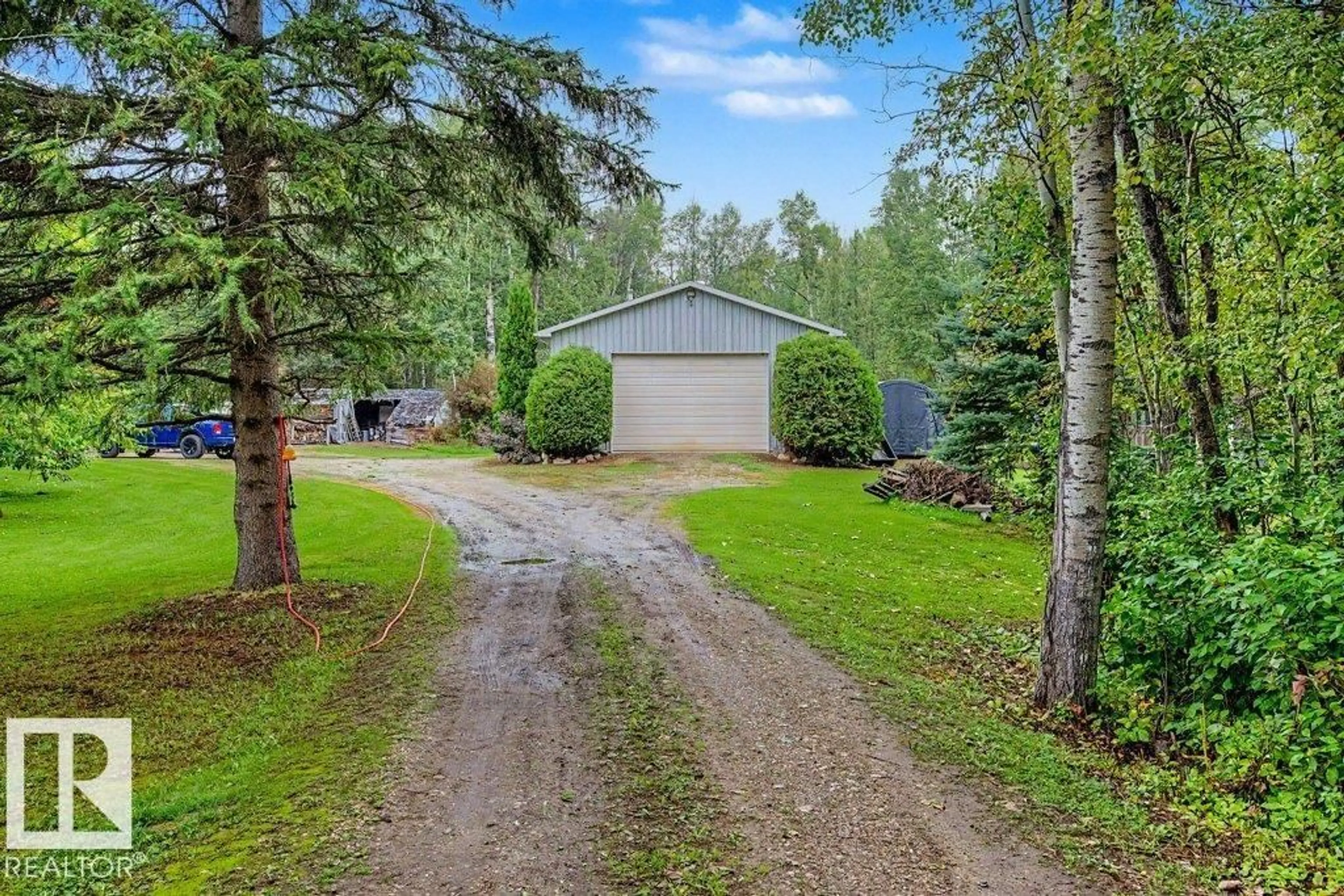 A pic from outside/outdoor area/front of a property/back of a property/a pic from drone, unknown for 12 53223 RGE ROAD 34, Rural Parkland County Alberta T0E0N0