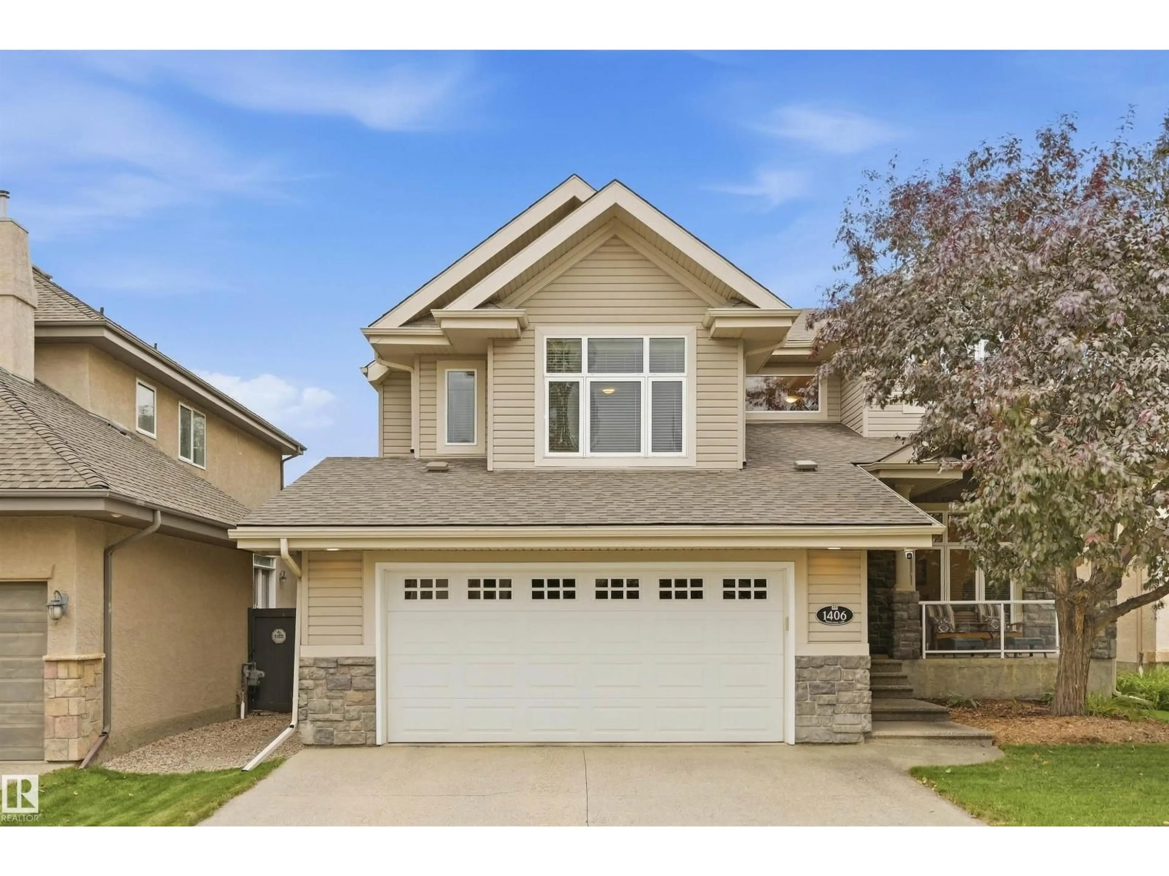 Home with vinyl exterior material, street for 1406 THOROGOOD LN, Edmonton Alberta T6R3K6