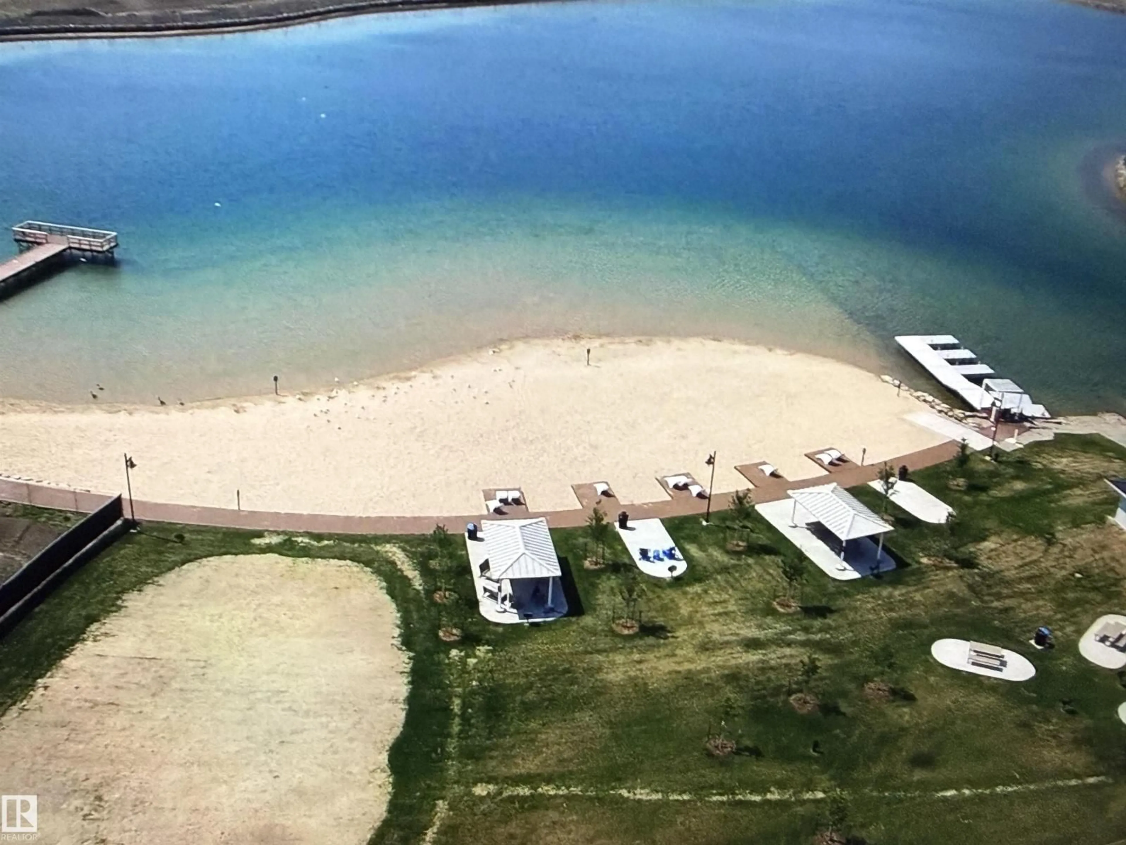 A pic from outside/outdoor area/front of a property/back of a property/a pic from drone, water/lake/river/ocean view for 56 100 JENSEN LAKES BV, St. Albert Alberta T8N7T9