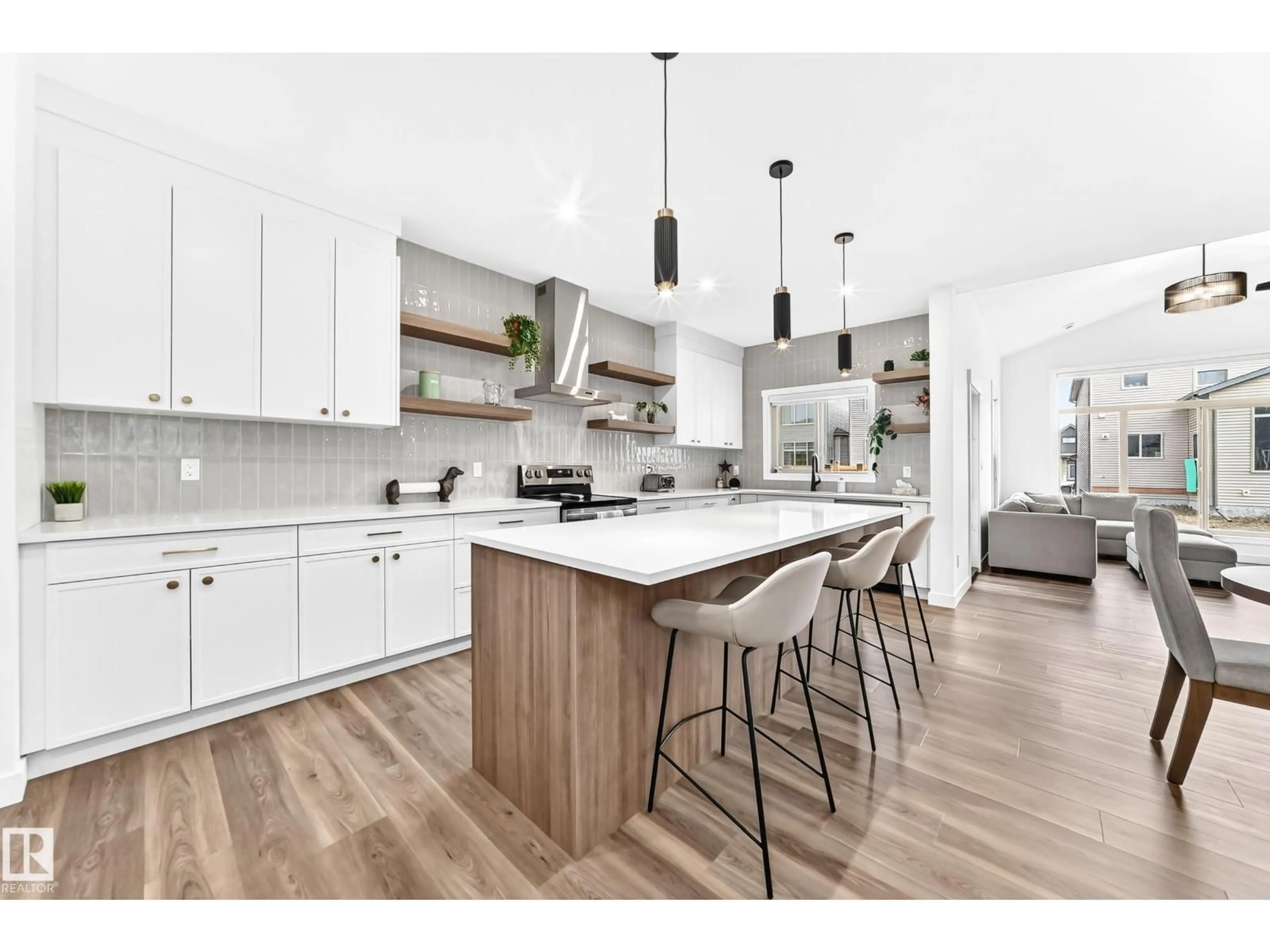 Open concept kitchen, wood/laminate floor for 66 GLADSTONE BN, Spruce Grove Alberta T7X0Z6