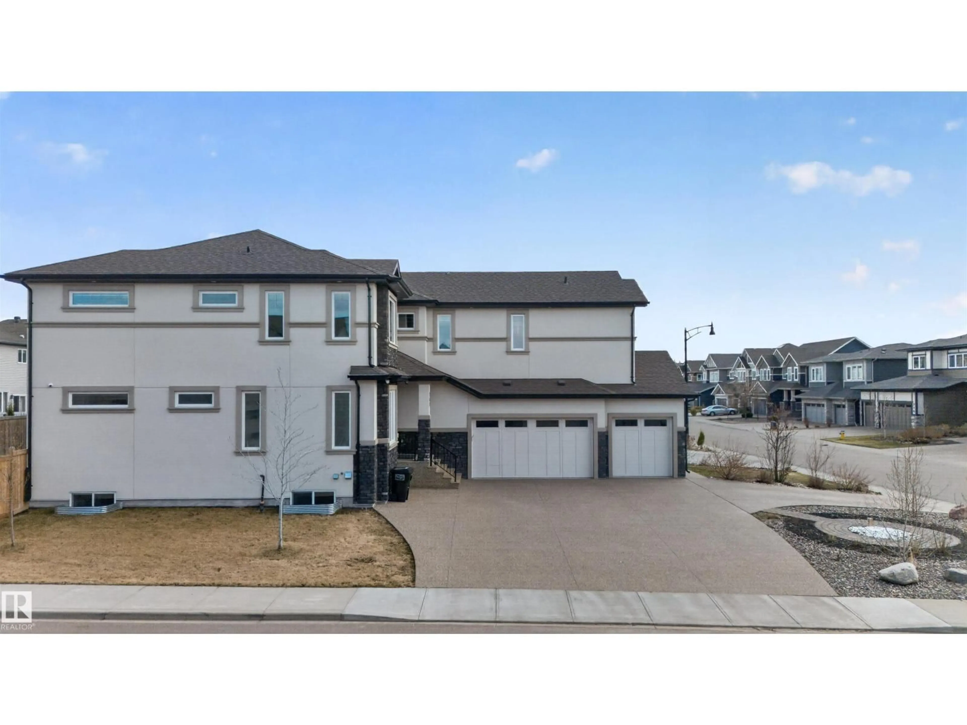 A pic from outside/outdoor area/front of a property/back of a property/a pic from drone, street for SW - 707 180 ST, Edmonton Alberta T6W2S8