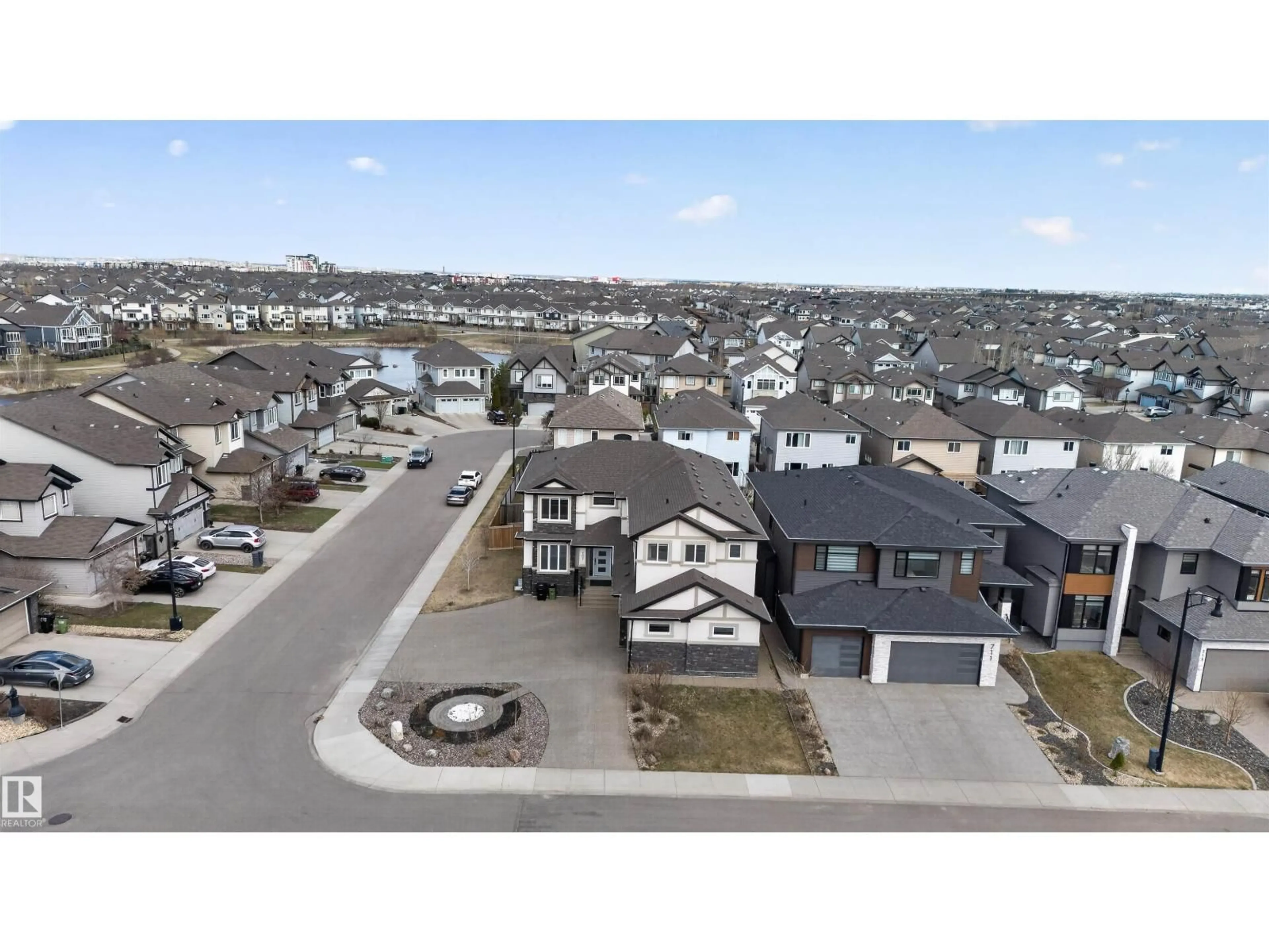 A pic from outside/outdoor area/front of a property/back of a property/a pic from drone, street for SW - 707 180 ST, Edmonton Alberta T6W2S8