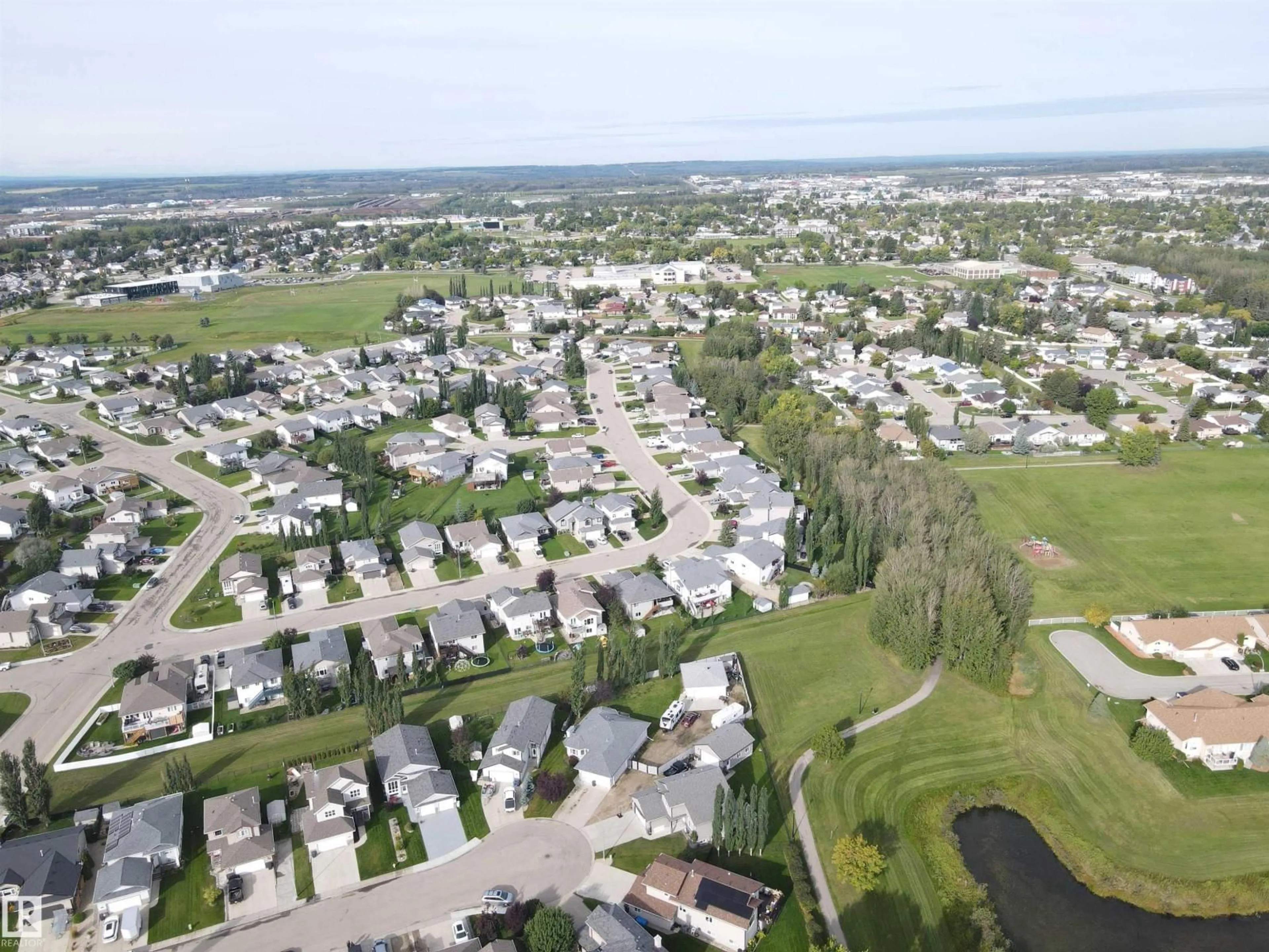A pic from outside/outdoor area/front of a property/back of a property/a pic from drone, water/lake/river/ocean view for 4464 36 ST, Drayton Valley Alberta T7A0A1
