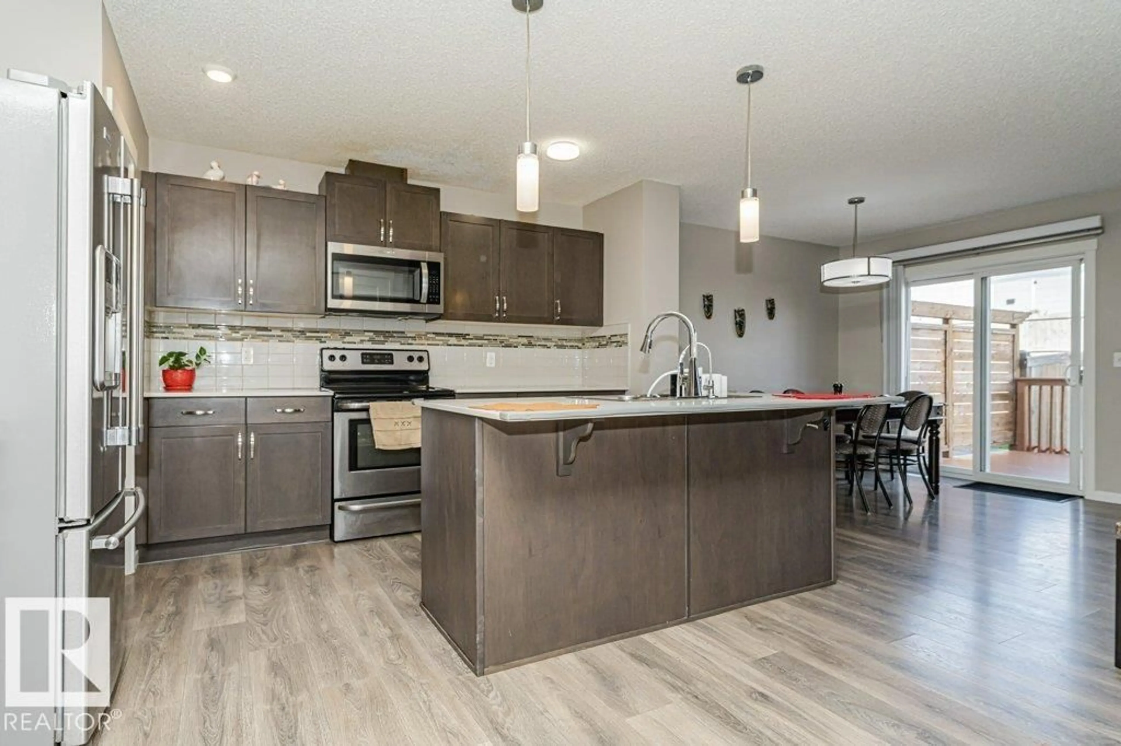 Open concept kitchen, unknown for 923 EBBERS CR, Edmonton Alberta T5Y3V1