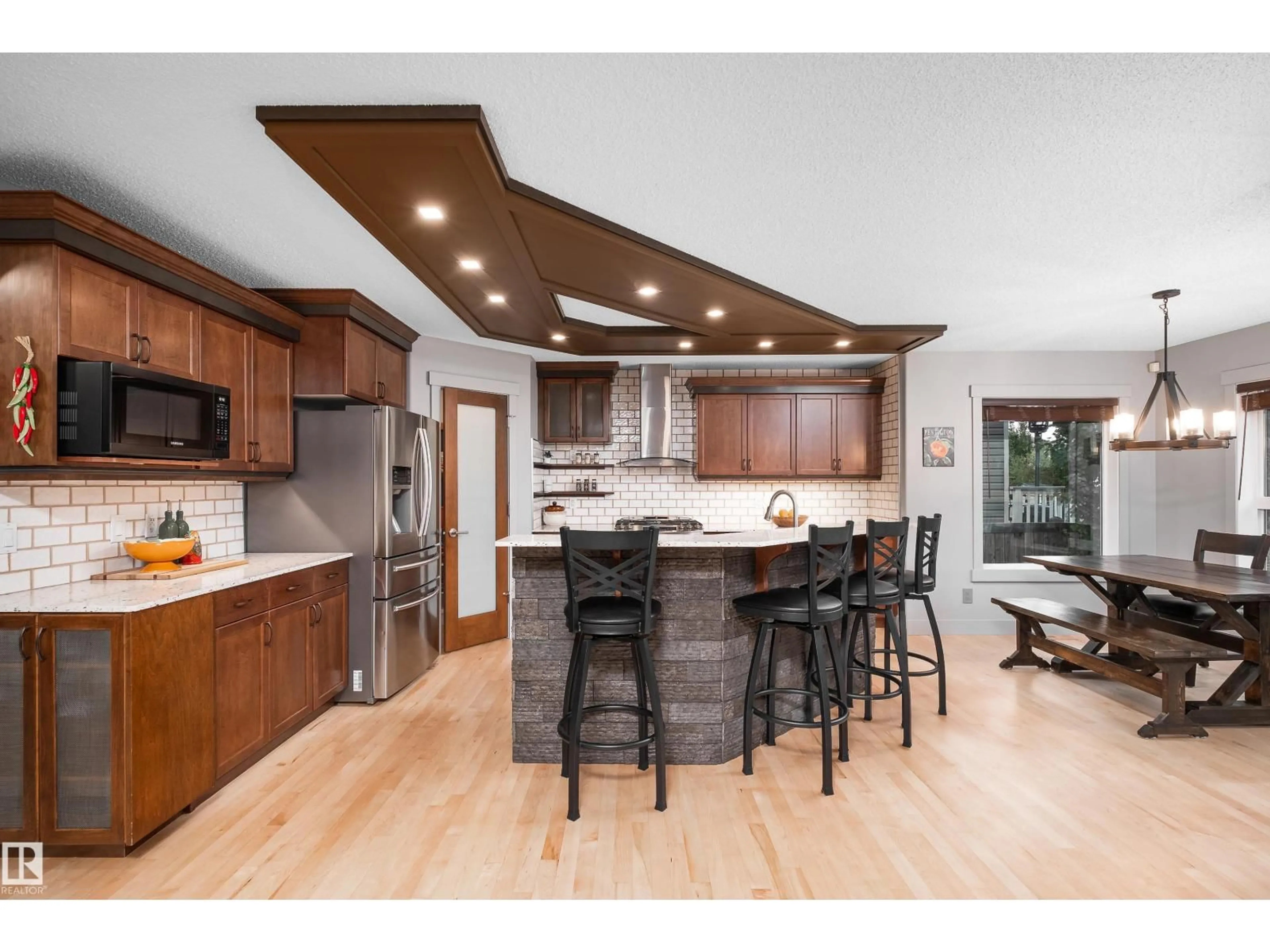Open concept kitchen, wood/laminate floor for 633 FOXTAIL LN, Sherwood Park Alberta T8A4P2