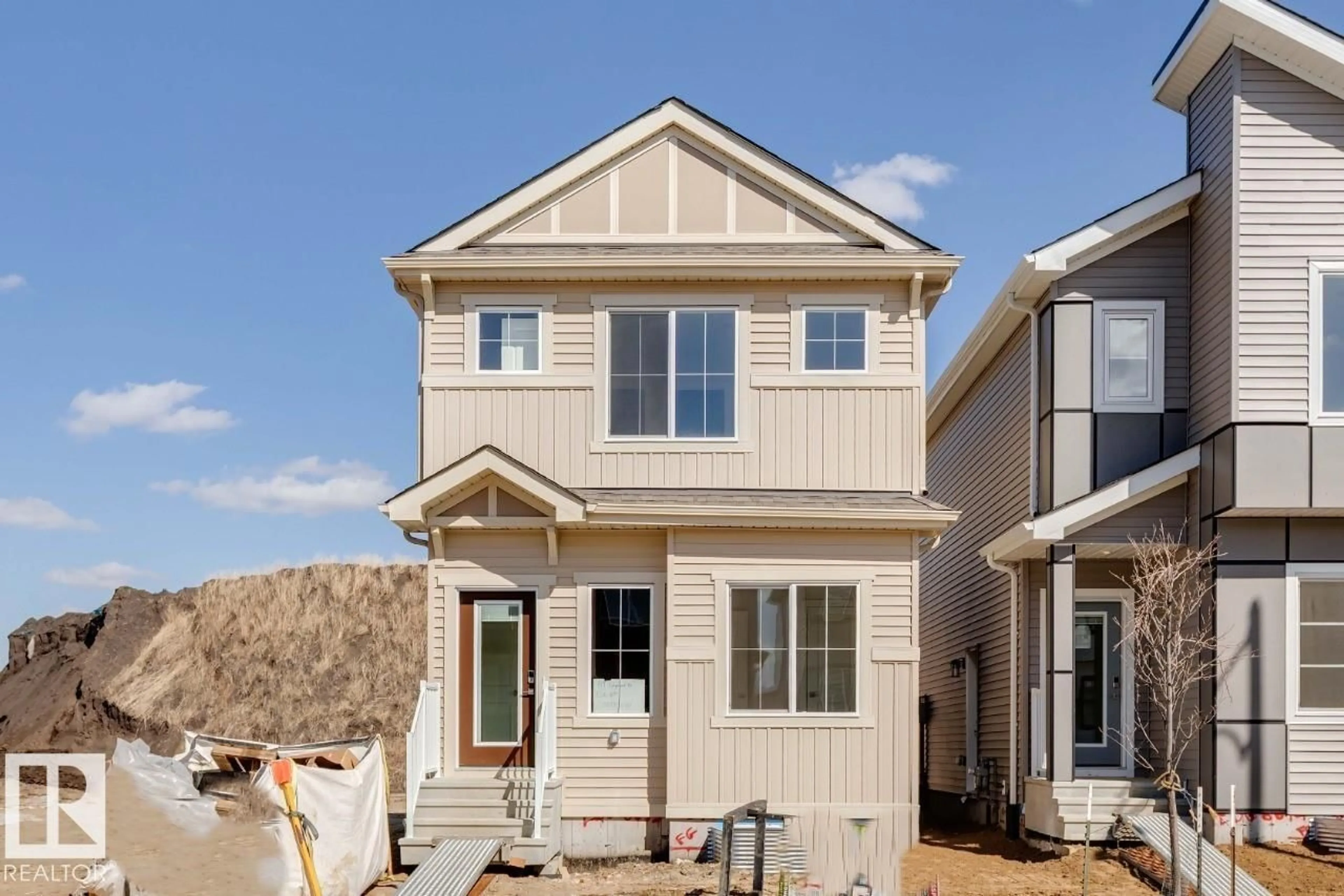 Home with vinyl exterior material, street for 319 EDGEMONT DR, Edmonton Alberta T6M3G7