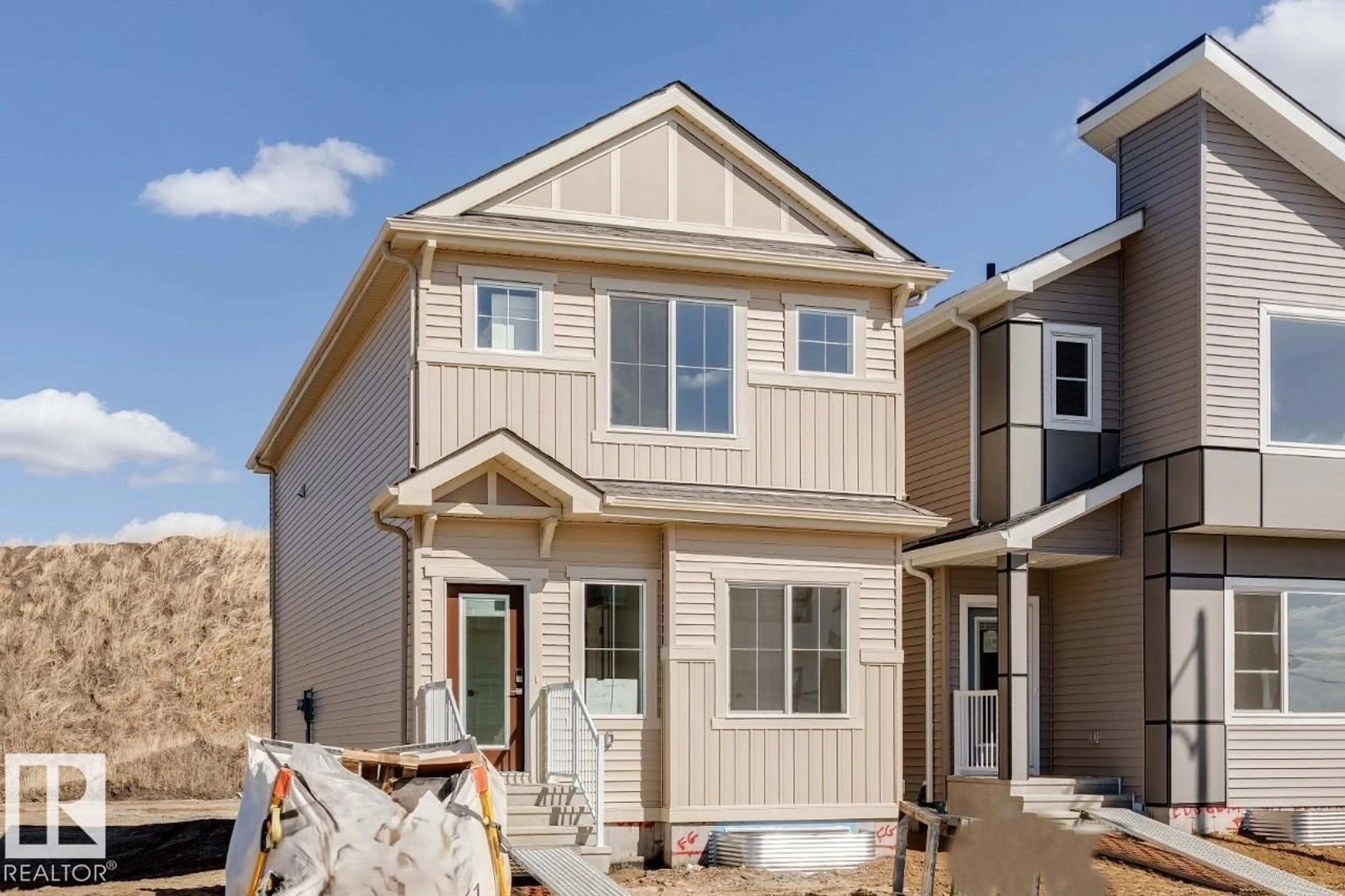 Home with vinyl exterior material, street for 319 EDGEMONT DR, Edmonton Alberta T6M3G7