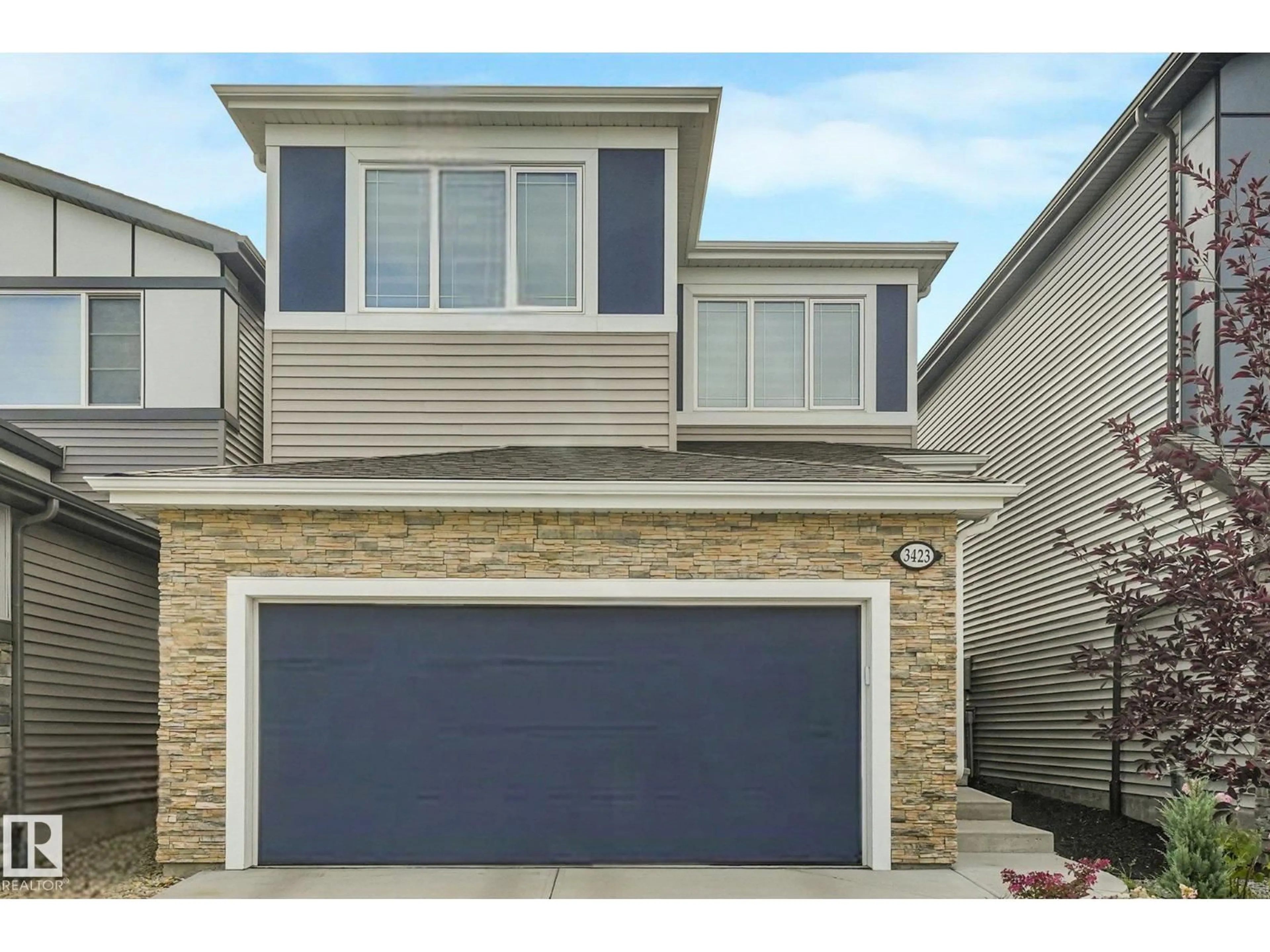 Home with vinyl exterior material, street for SW - 3423 KULAY GR, Edmonton Alberta T6W5H3