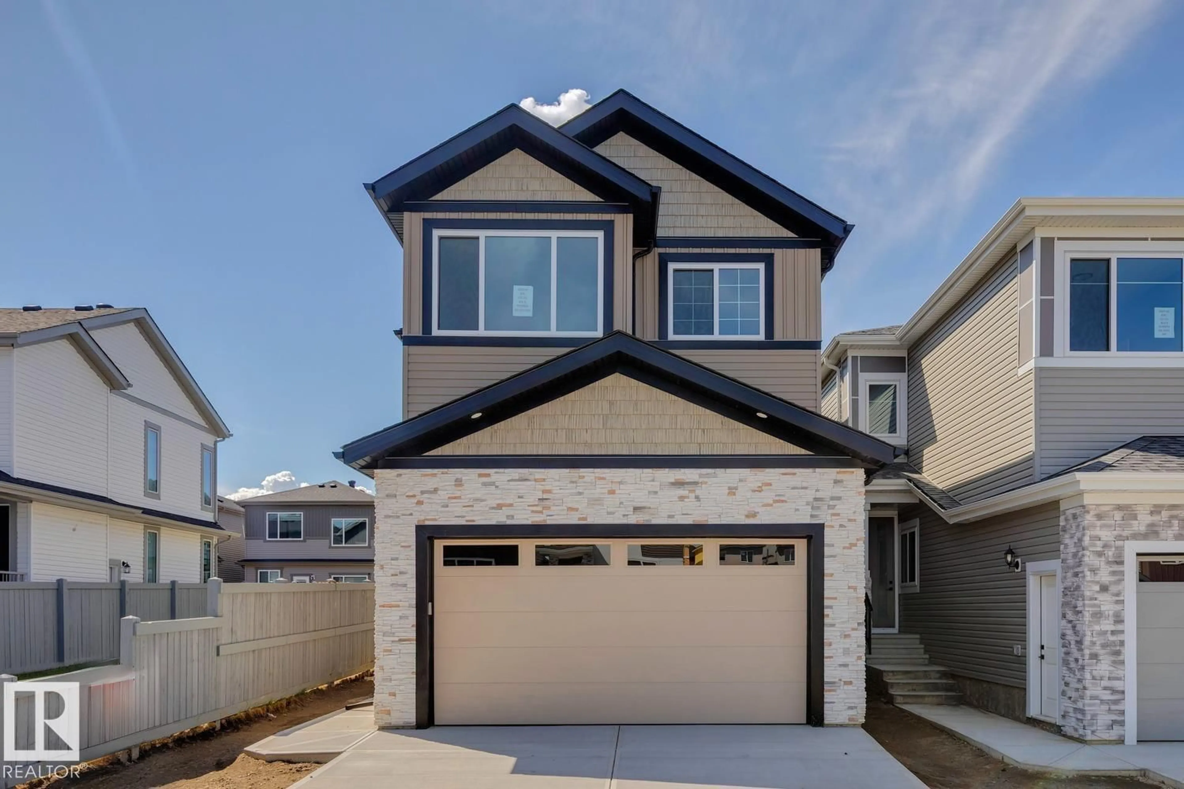 Home with vinyl exterior material, street for 3529 42 AV, Beaumont Alberta T4X3G4