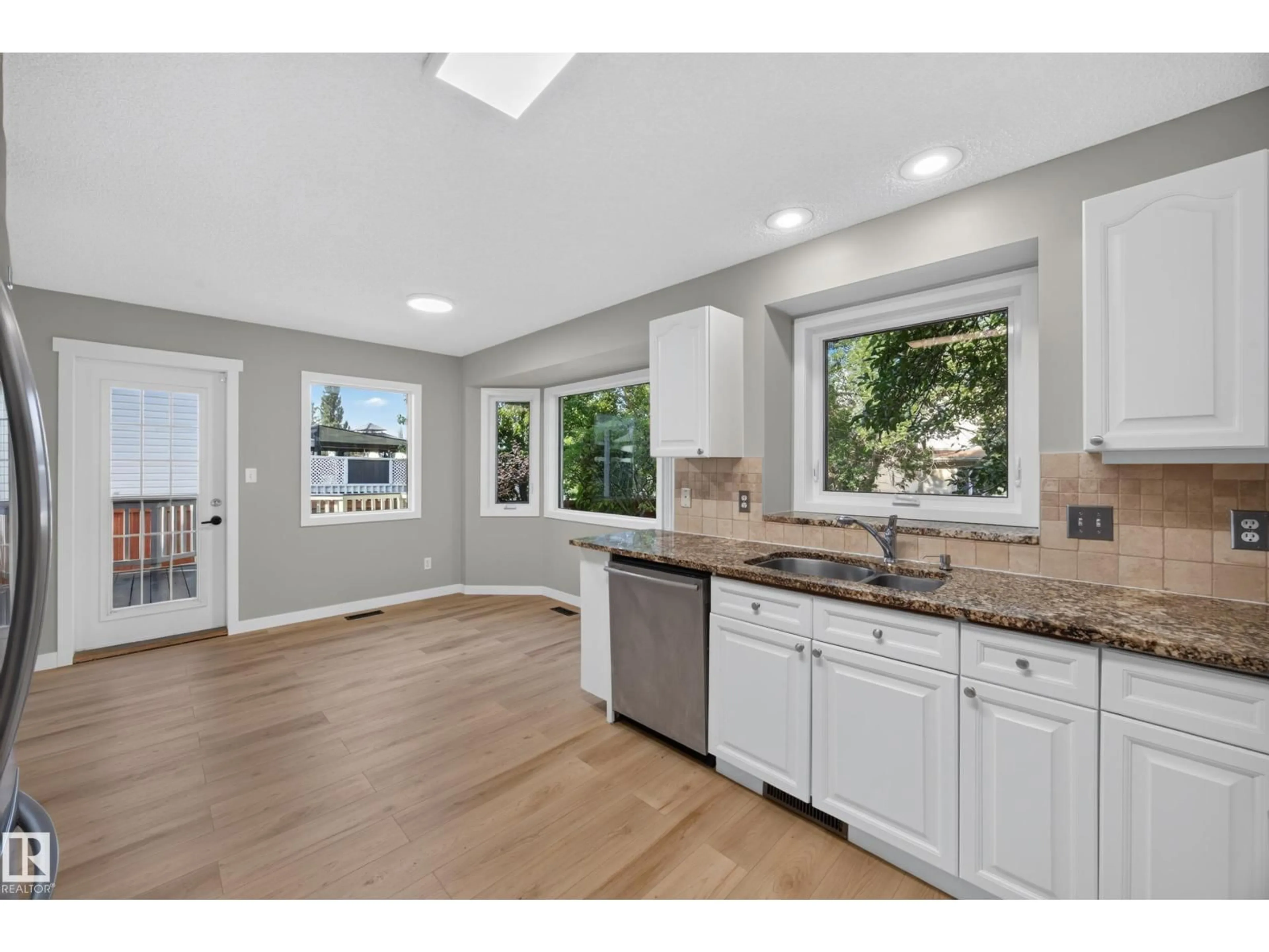 Open concept kitchen, unknown for 3640 31 ST, Edmonton Alberta T6T1G8