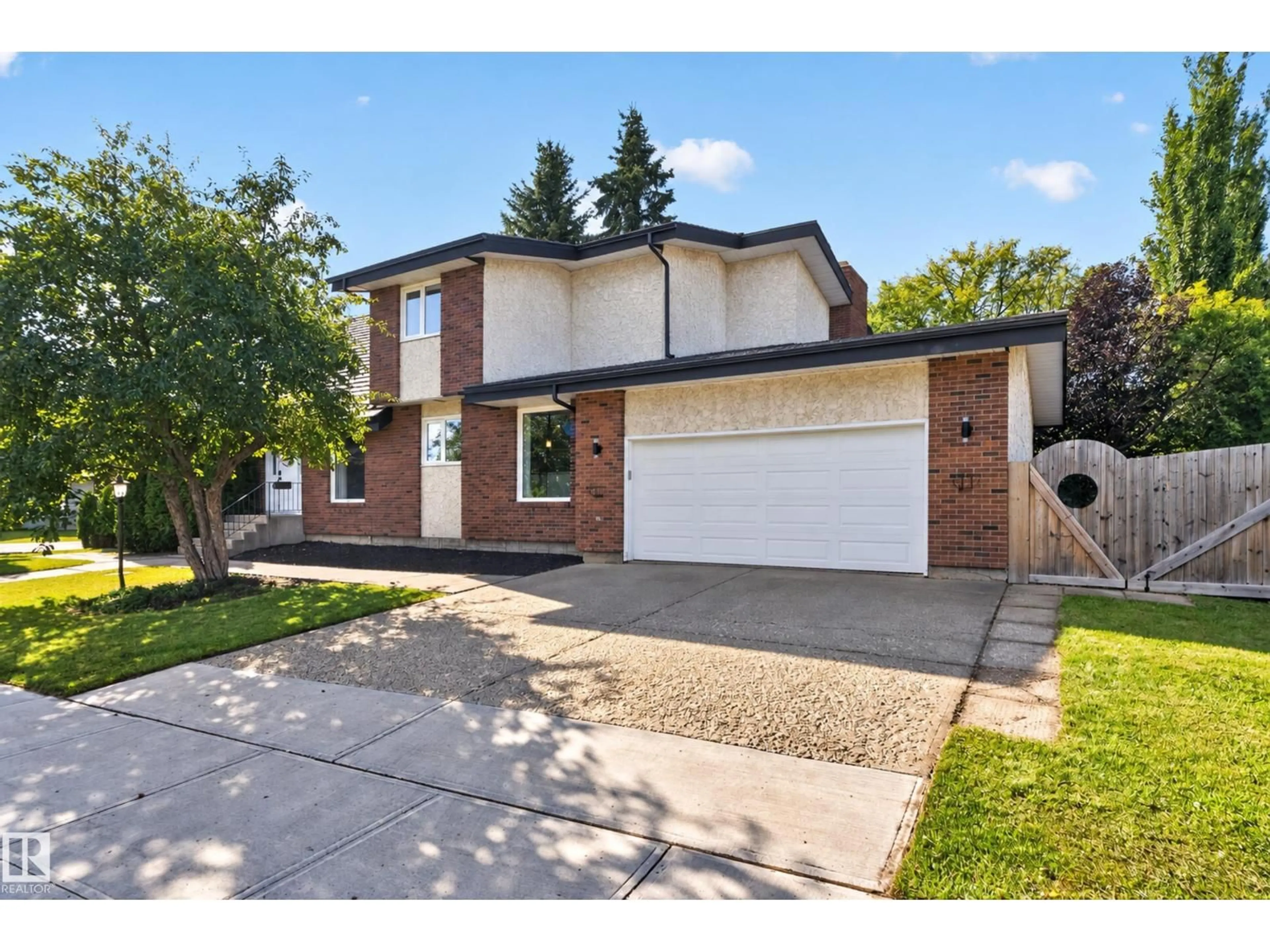 Home with brick exterior material, street for 311 LESSARD DR, Edmonton Alberta T6M1A6