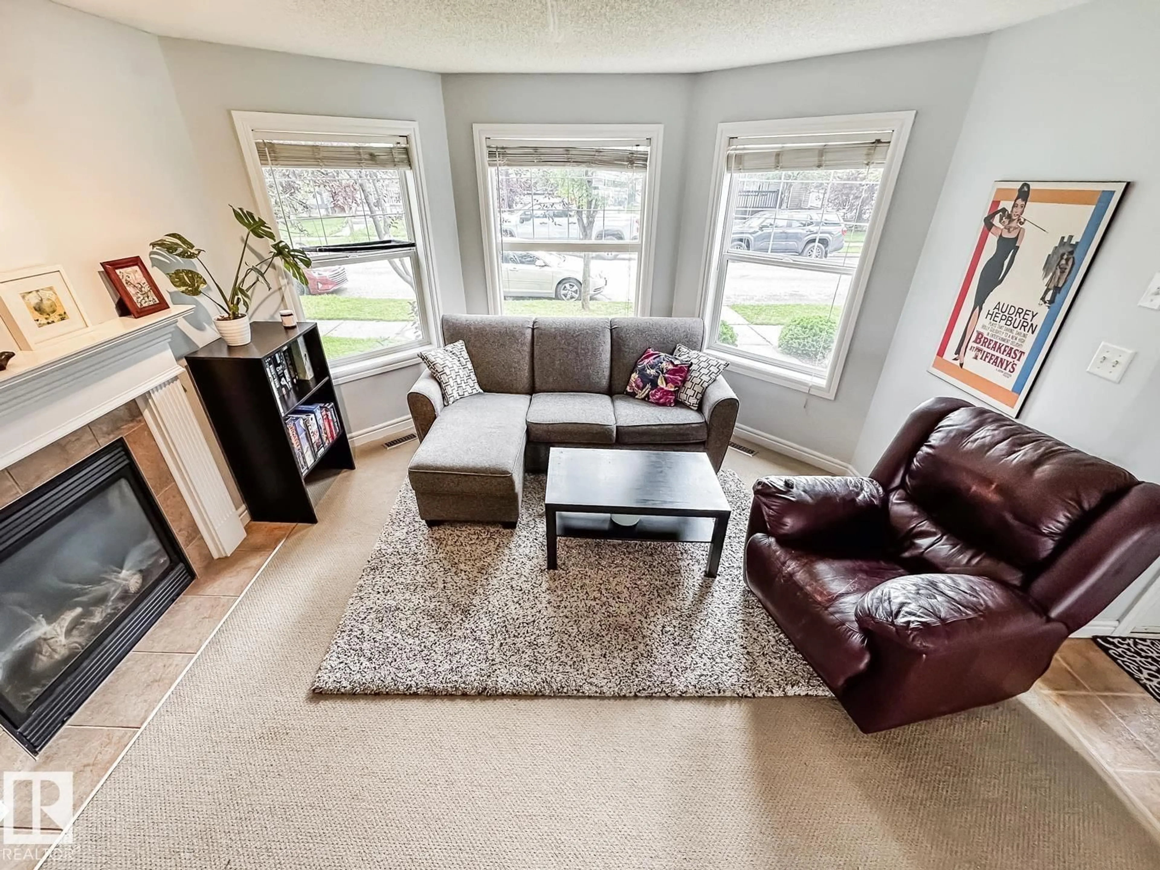 Living room with furniture, carpet floor for 12060 19 AV, Edmonton Alberta T6W1W5