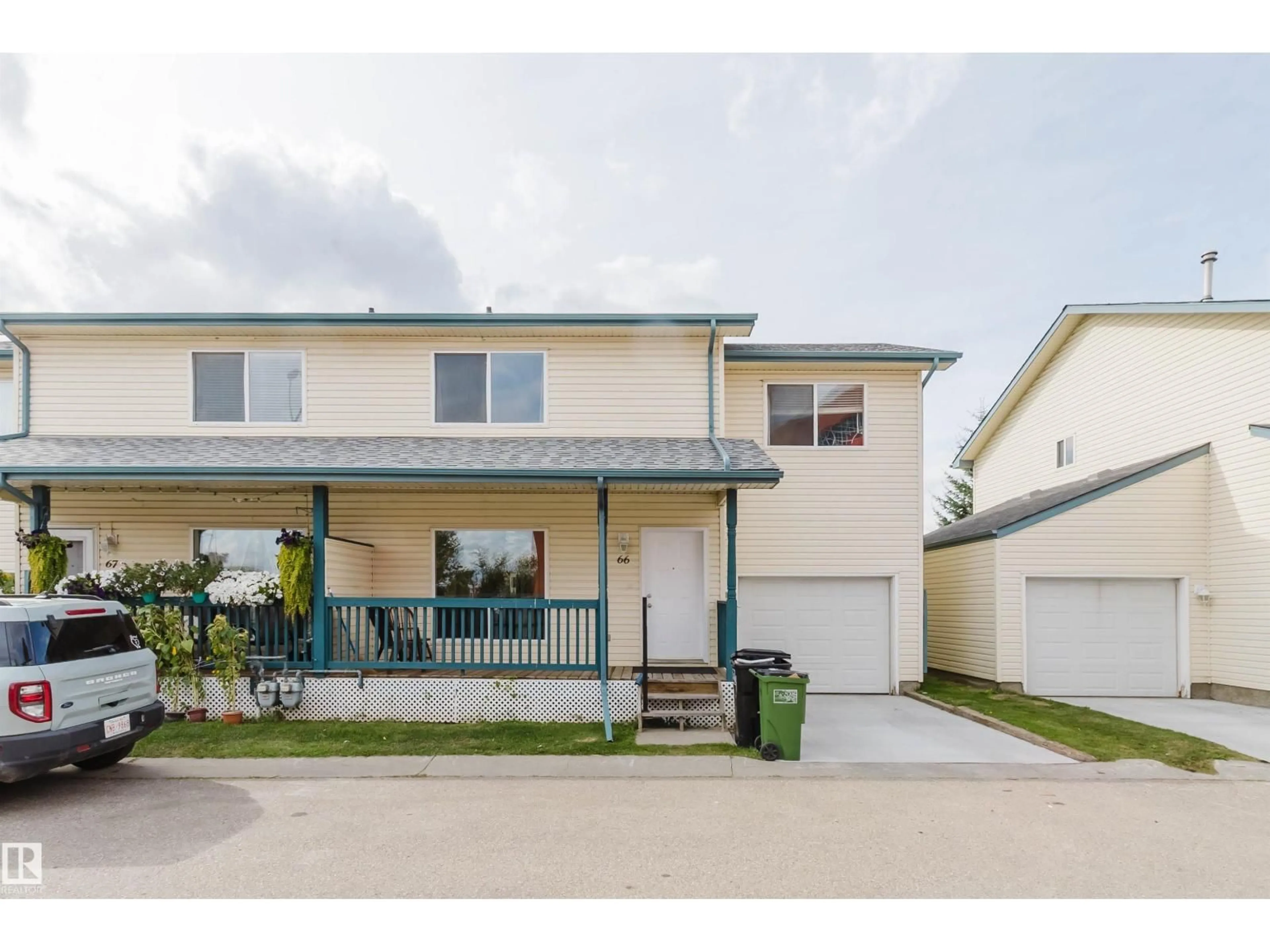 Home with vinyl exterior material, street for 66 - 10909 106 ST NW, Edmonton Alberta T5H4M7