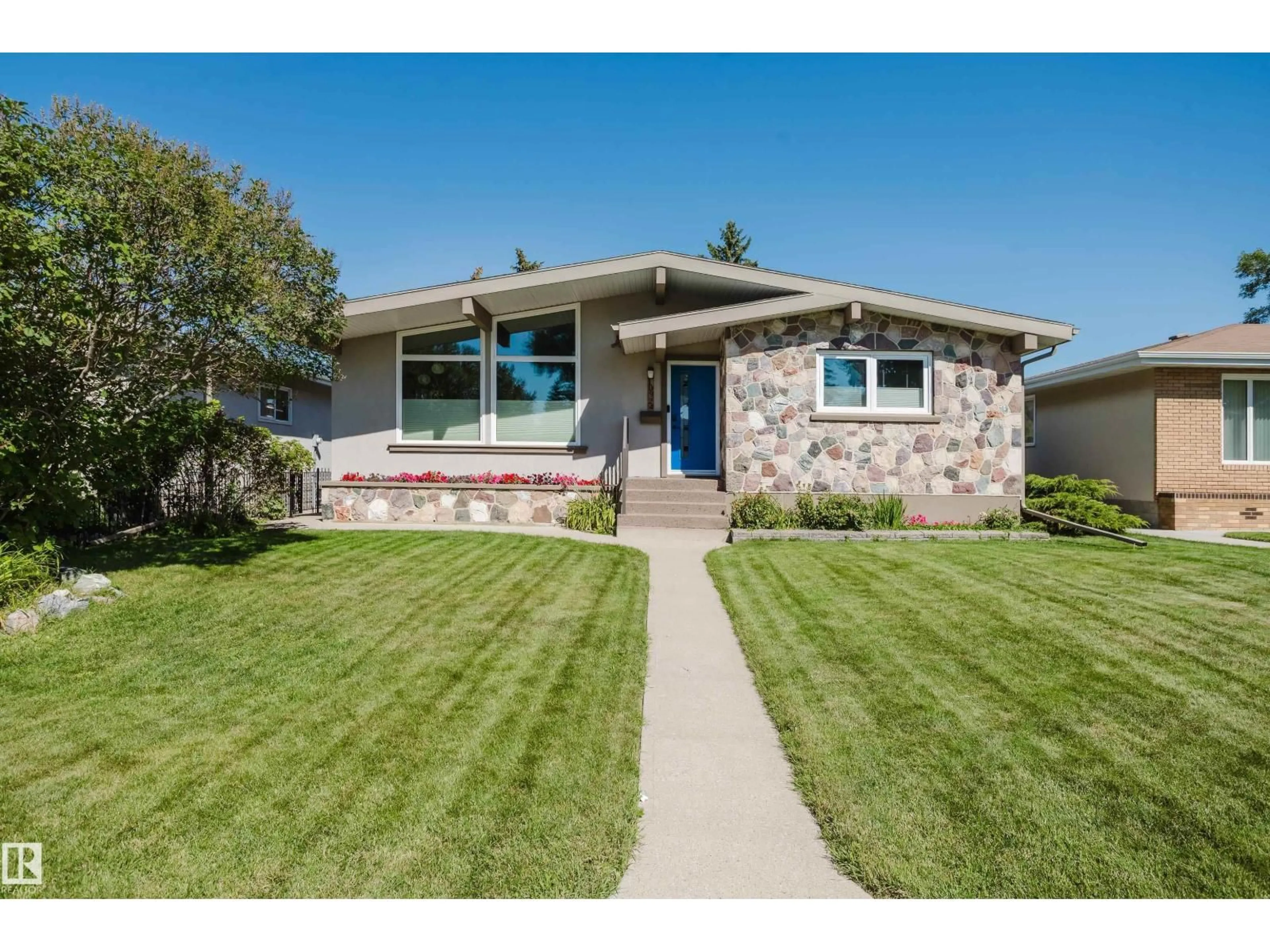 Home with brick exterior material, street for 10924 35A AV, Edmonton Alberta T6J0A3