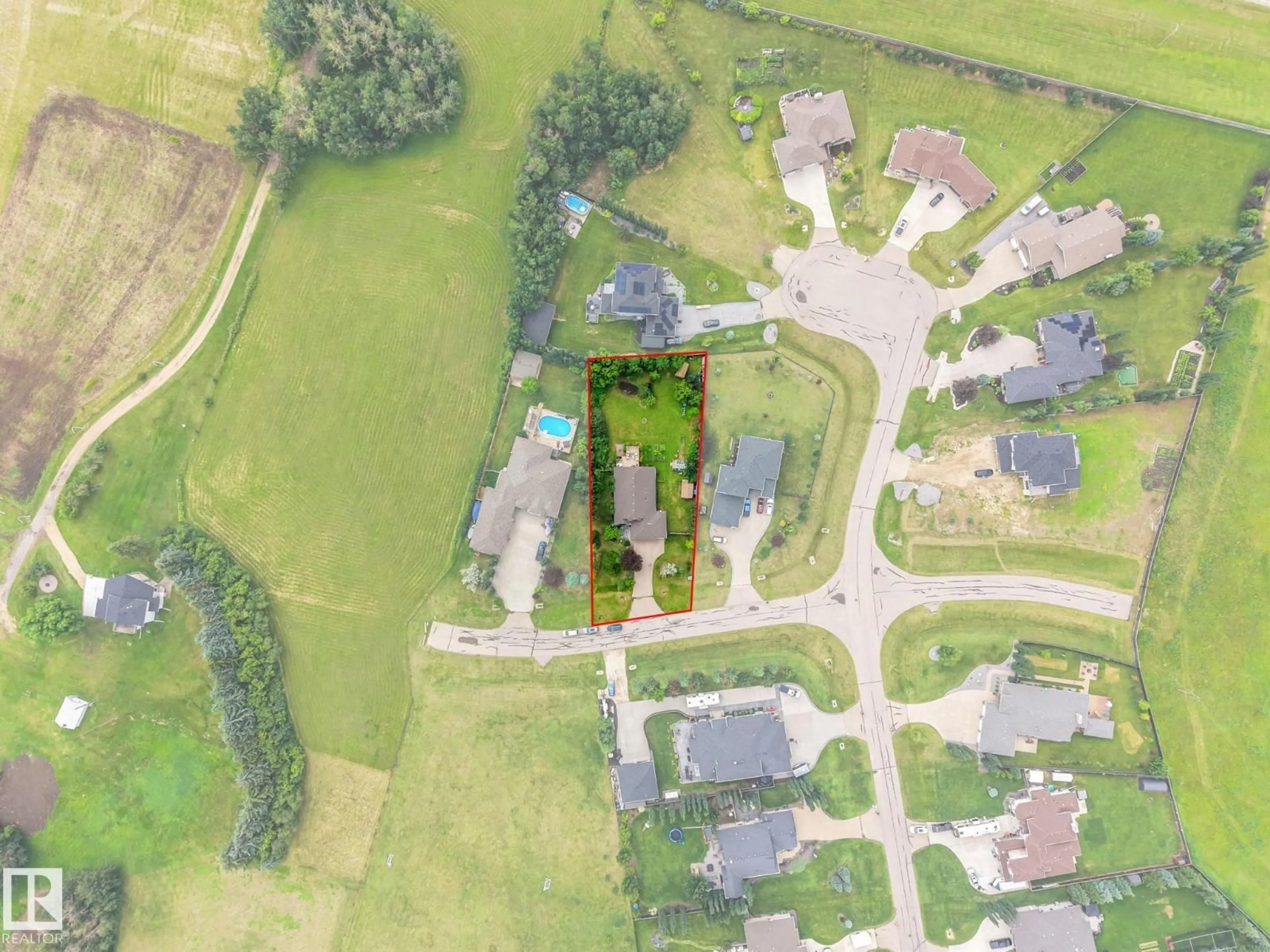 A pic from outside/outdoor area/front of a property/back of a property/a pic from drone, street for 59 TWP ROAD 532 A, Rural Parkland County Alberta T7Y1A1