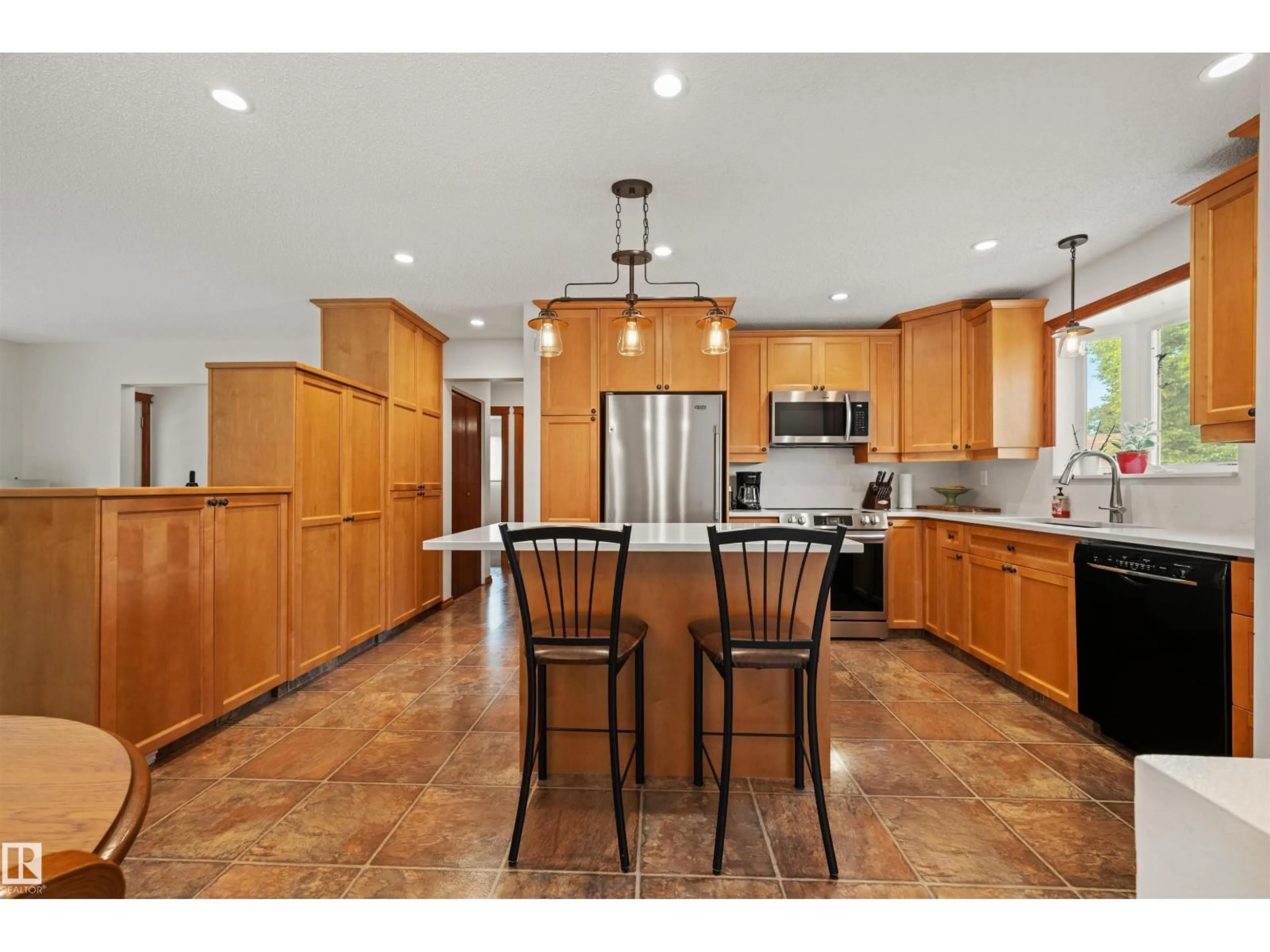 Open concept kitchen, ceramic/tile floor for 704 WARWICK RD, Edmonton Alberta T5X4R3