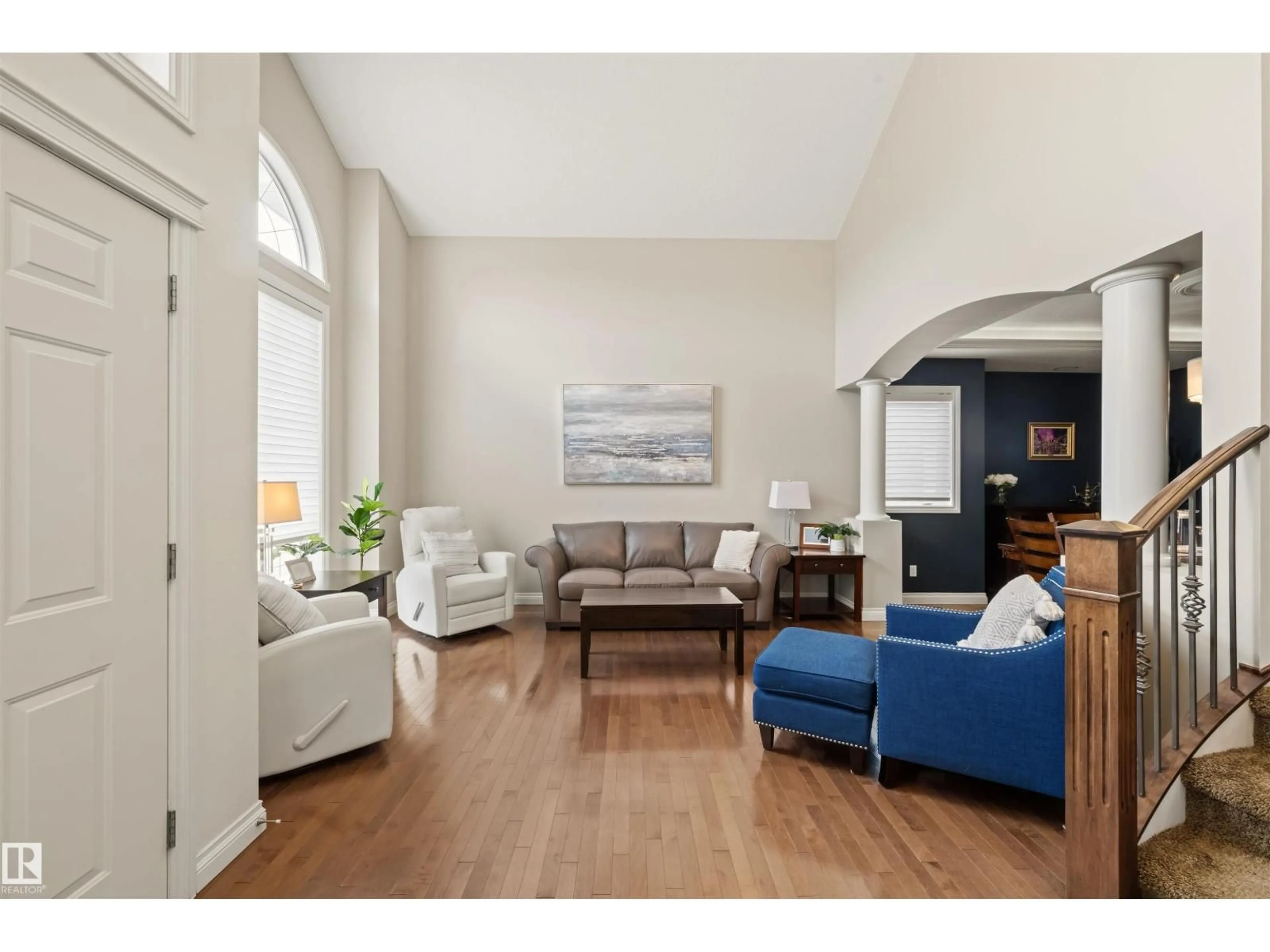 Living room with furniture, wood/laminate floor for 745 TODD LANDING LD, Edmonton Alberta T6R3C4