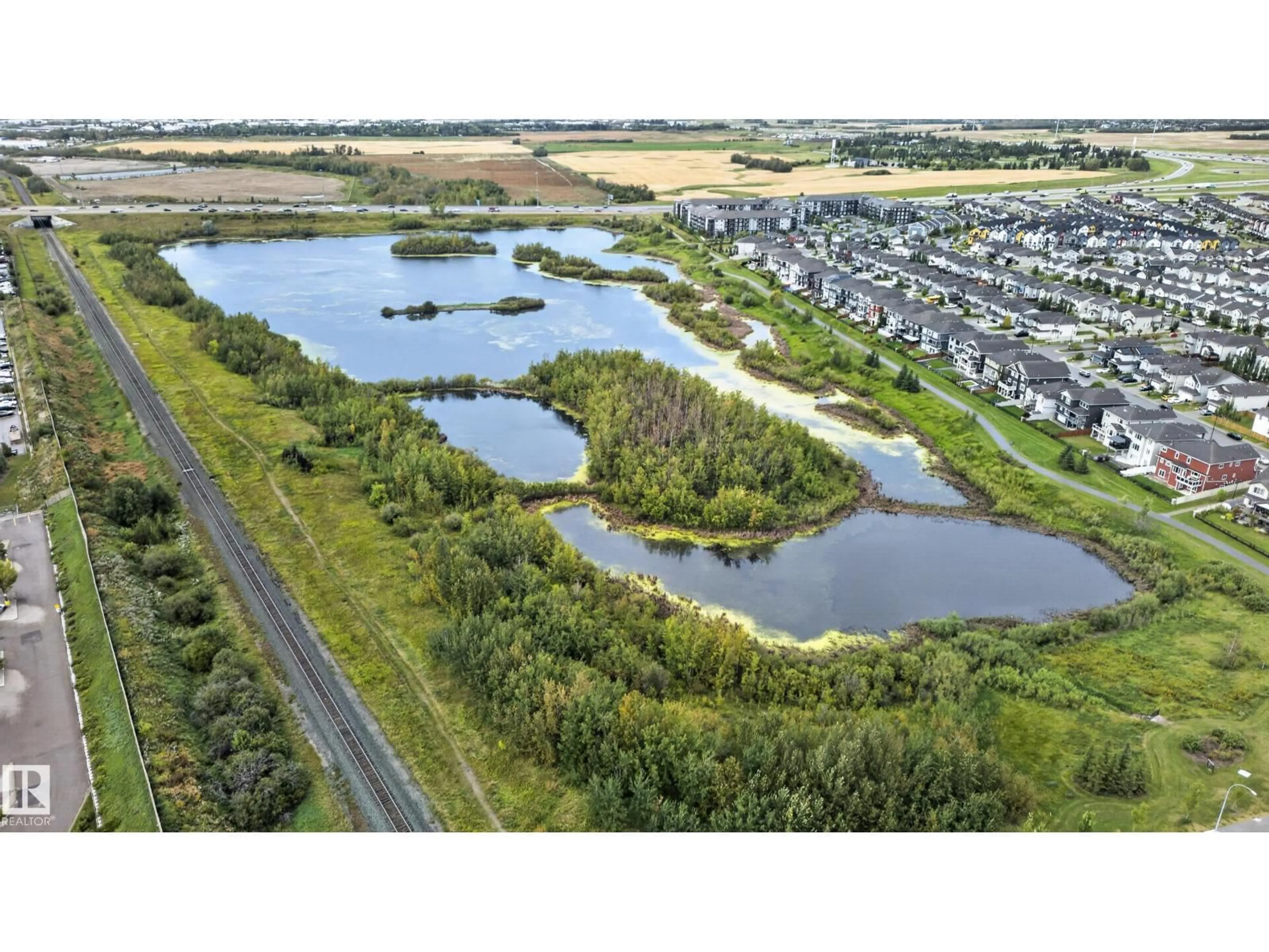 A pic from outside/outdoor area/front of a property/back of a property/a pic from drone, water/lake/river/ocean view for 3746 12 STREET, Edmonton Alberta T6T0E6