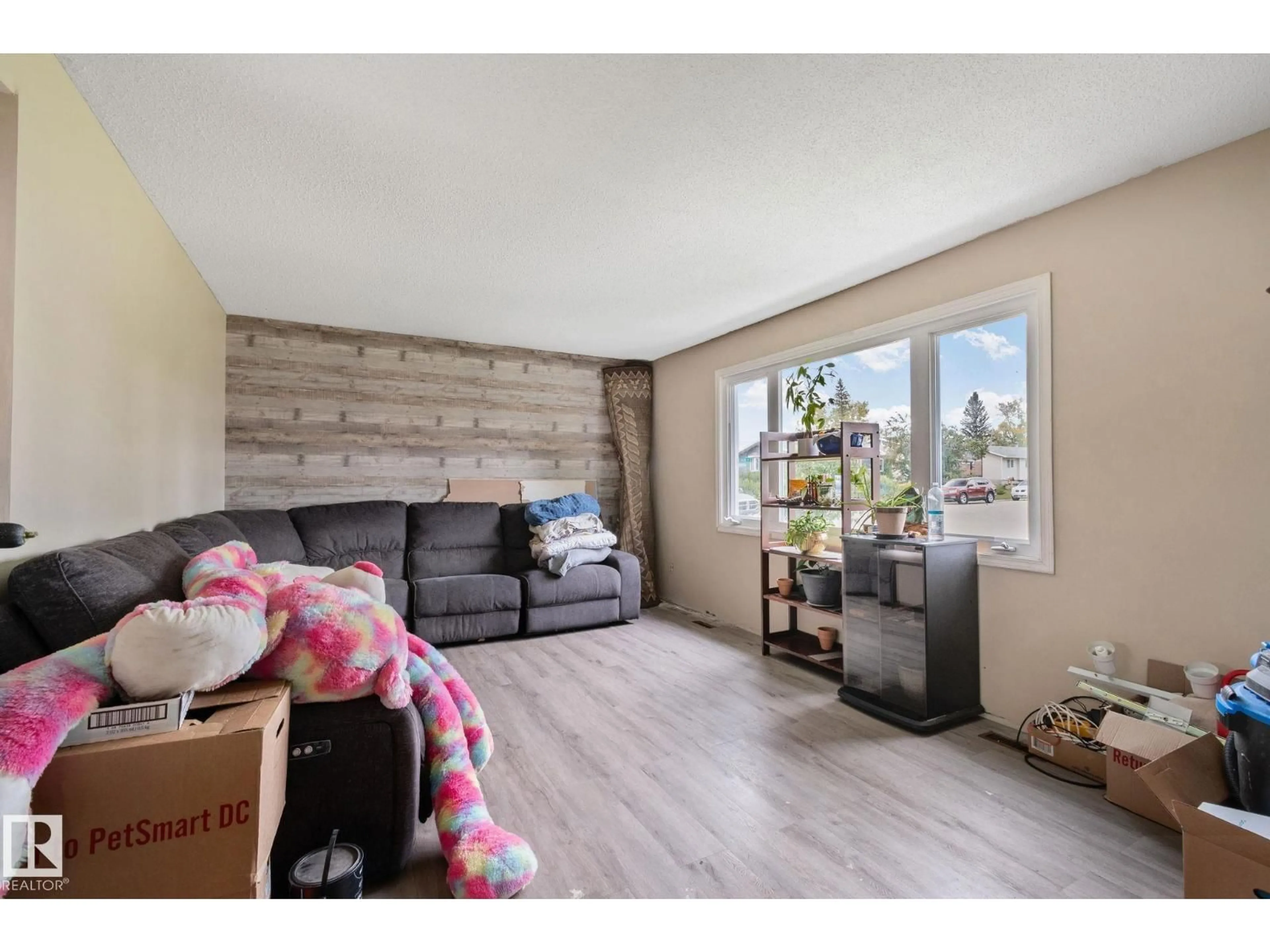 Living room with furniture, wood/laminate floor for 31 LINDEN ST, Spruce Grove Alberta T7X2G5