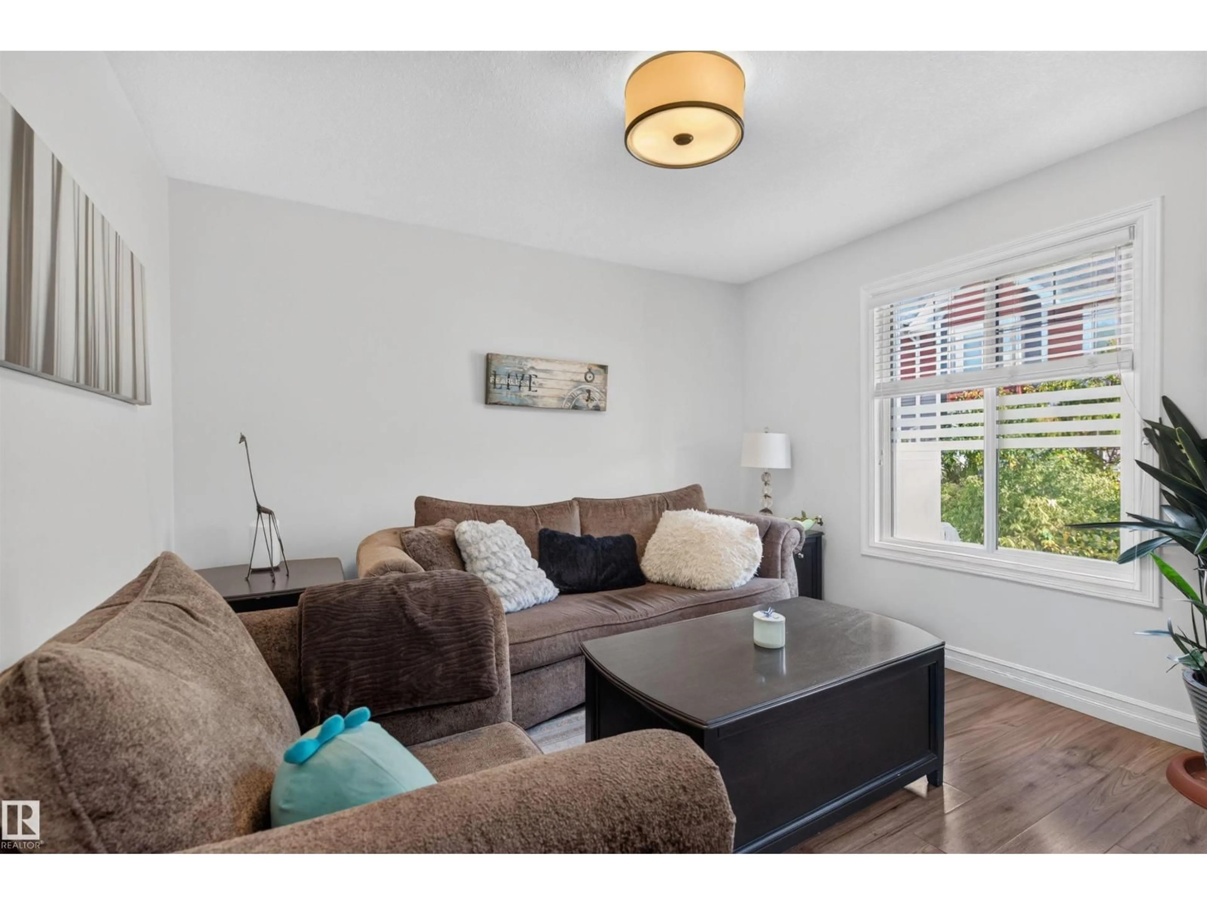 Living room with furniture, wood/laminate floor for #35 - 1508 105 ST NW, Edmonton Alberta T6J5R8