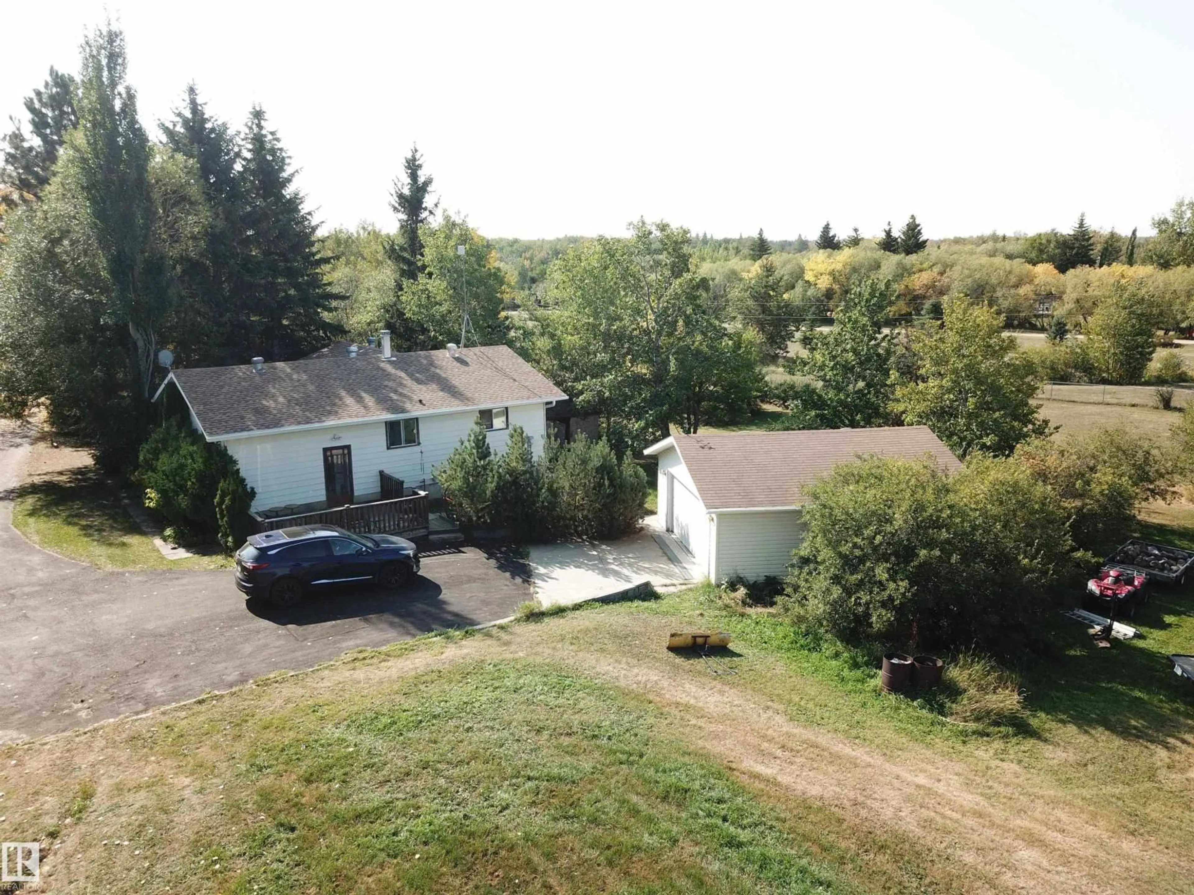A pic from outside/outdoor area/front of a property/back of a property/a pic from drone, unknown for 390 50448 RG RD RD, Rural Leduc County Alberta T0B3M2