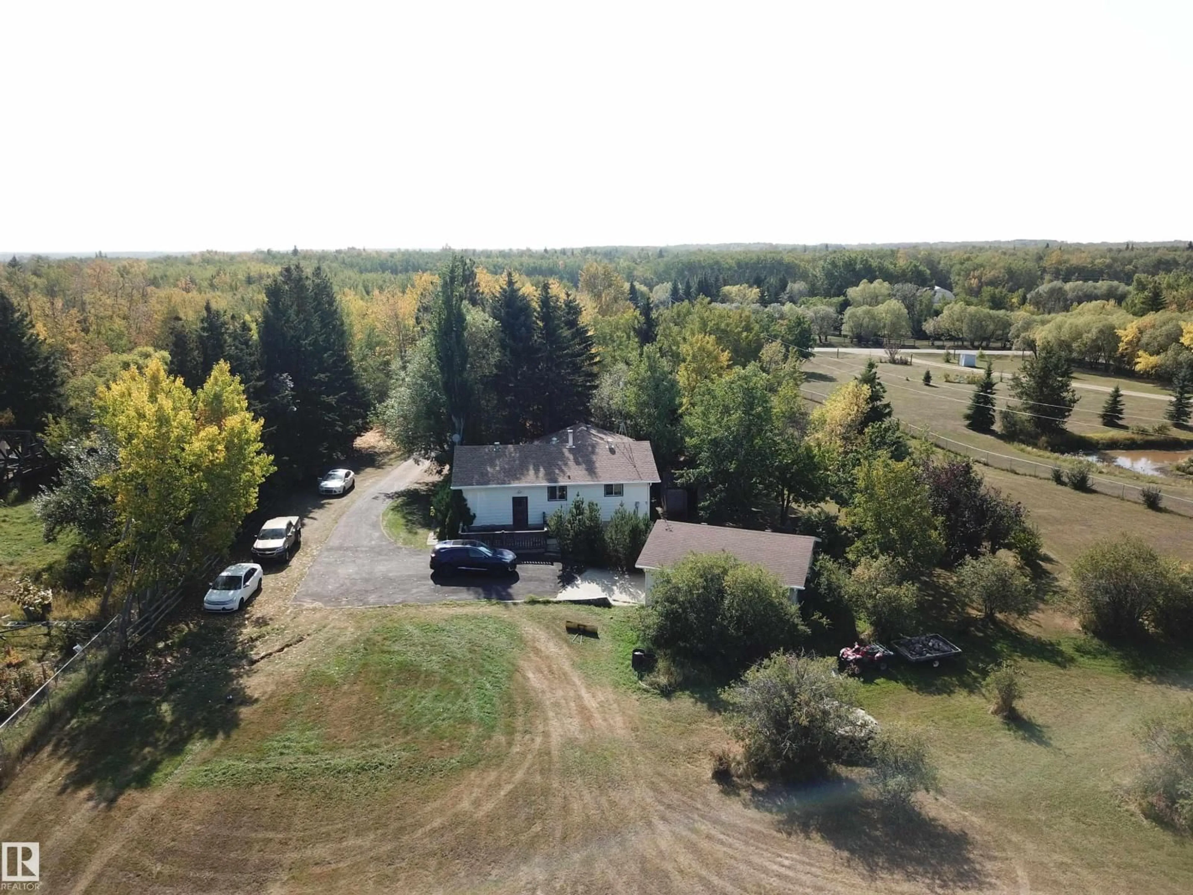 A pic from outside/outdoor area/front of a property/back of a property/a pic from drone, unknown for 390 50448 RG RD RD, Rural Leduc County Alberta T0B3M2